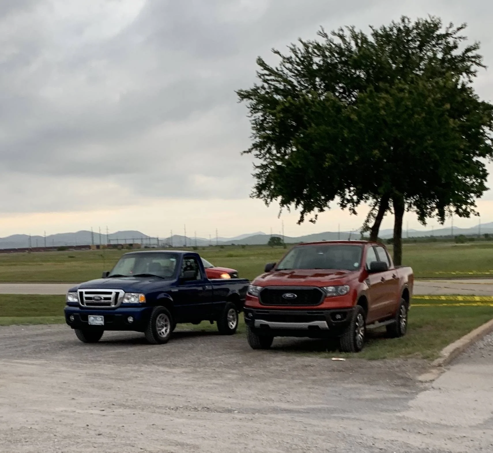 Ford Ranger Look at my Ranger parked next to stuff D17D2616-AEB7-44BA-8A25-12898E8D776A