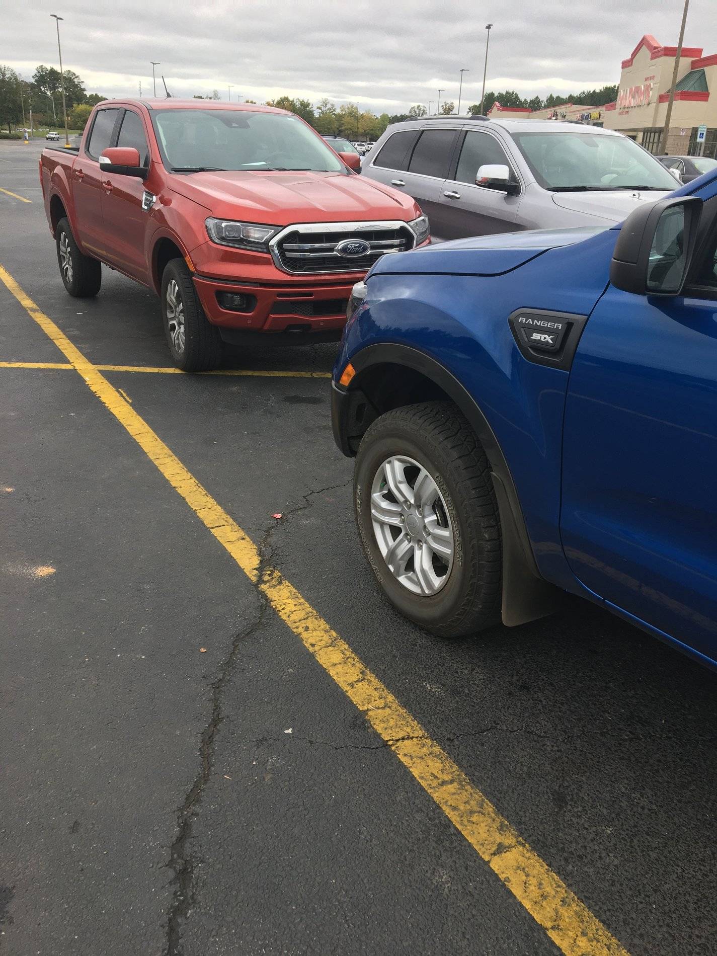 Ford Ranger Look at my Ranger parked next to stuff 53655DFF-1015-4FA0-83D9-BE79DE01977C