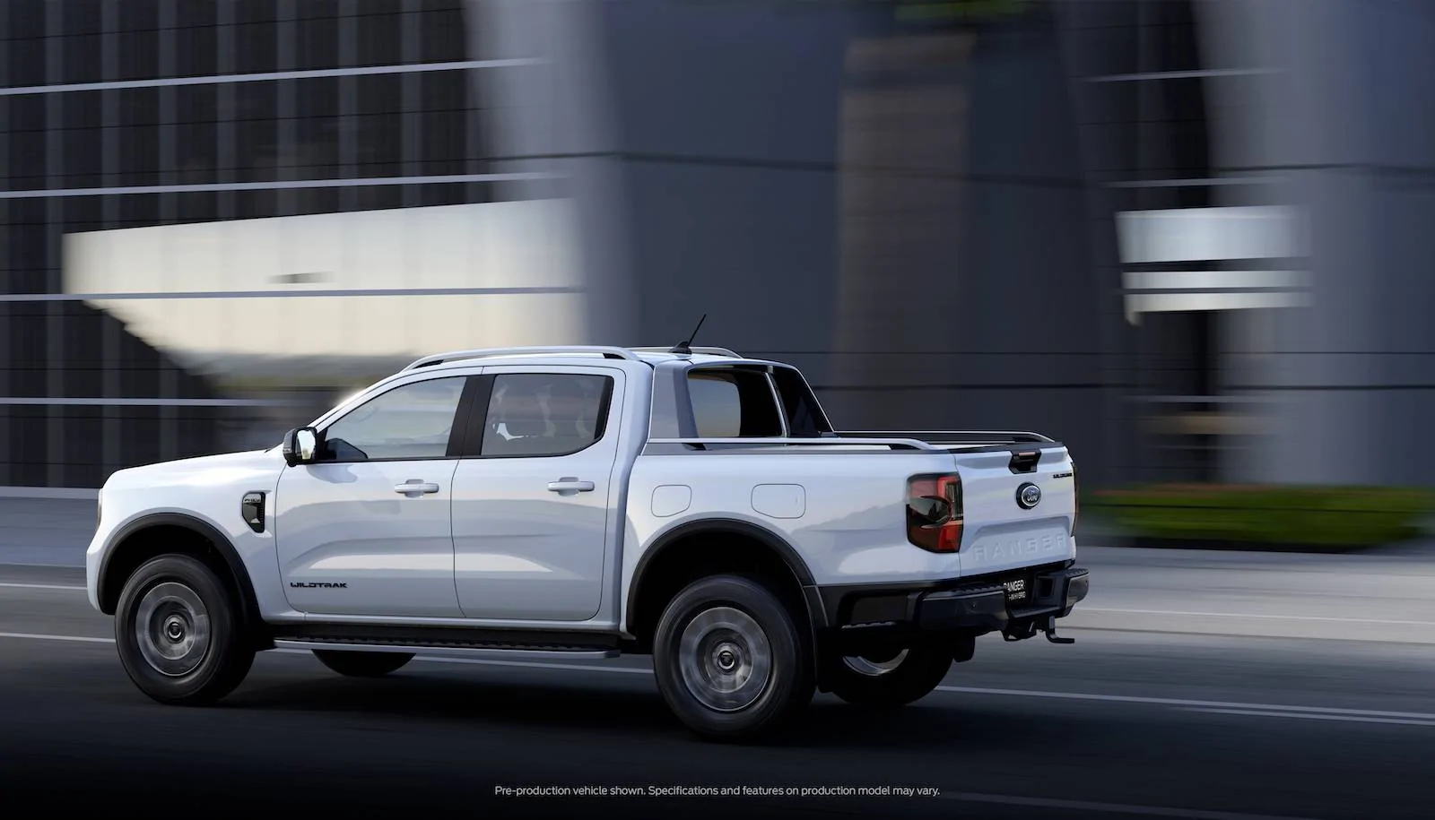 Ford Ranger 2025 Ranger PHEV Hybrid Revealed w/ Pro Power Onboard, 28 Miles Range, Arriving Early 2025 (Europe/AUS) P703_23-PHEV City Driving Rear RHD