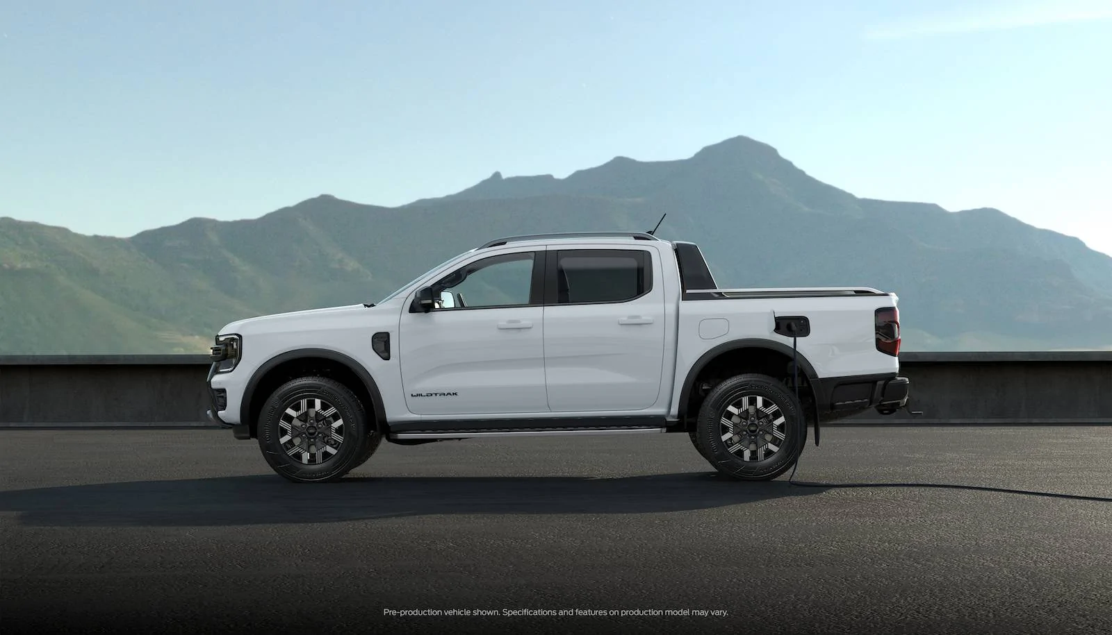Ford Ranger 2025 Ranger PHEV Hybrid Revealed w/ Pro Power Onboard, 28 Miles Range, Arriving Early 2025 (Europe/AUS) P703_PHEV - Side View Static - RHD Standard - CHARGING