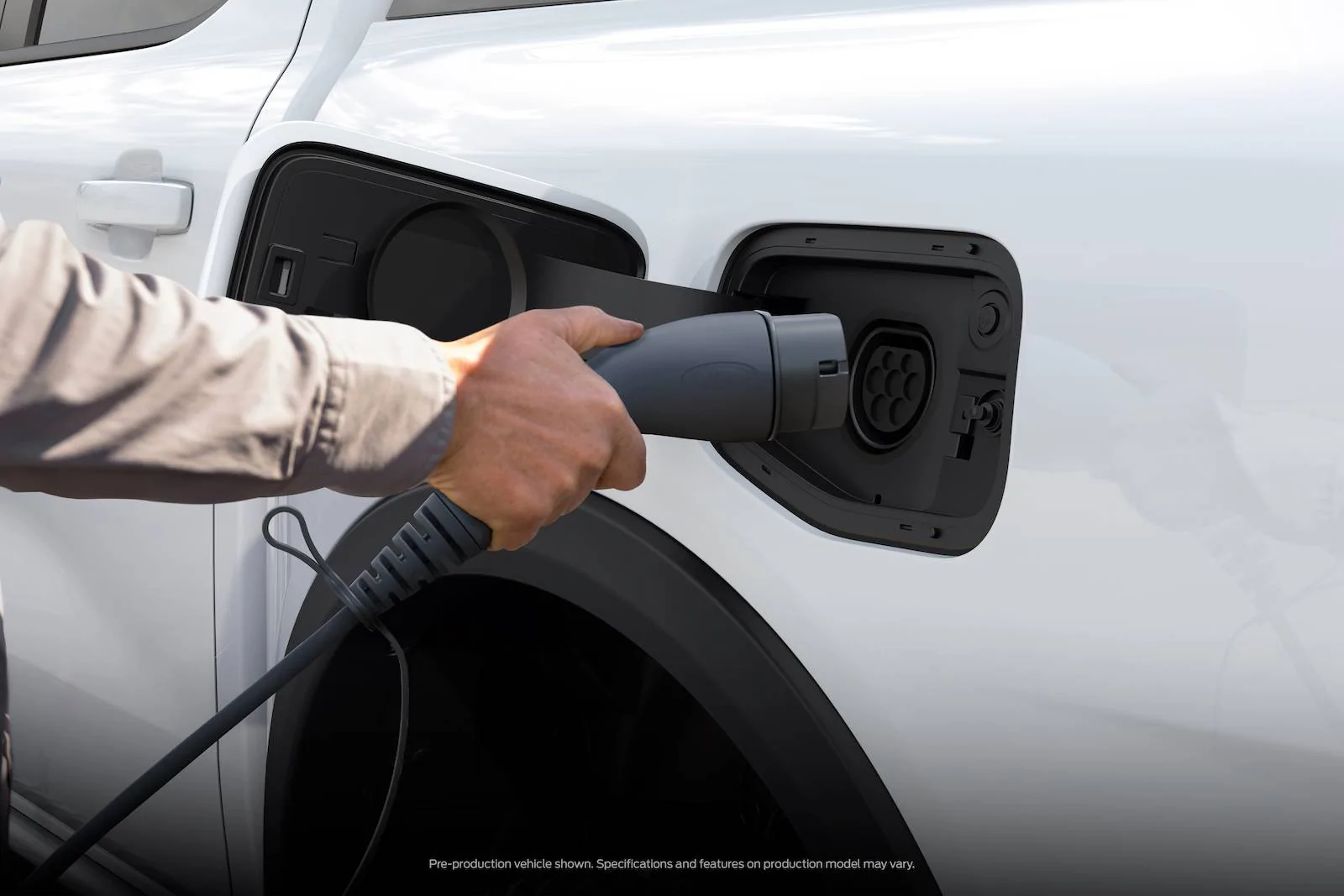 Ford Ranger 2025 Ranger PHEV Hybrid Revealed w/ Pro Power Onboard, 28 Miles Range, Arriving Early 2025 (Europe/AUS) Ranger PHEV_AU_Charging Close Up v2