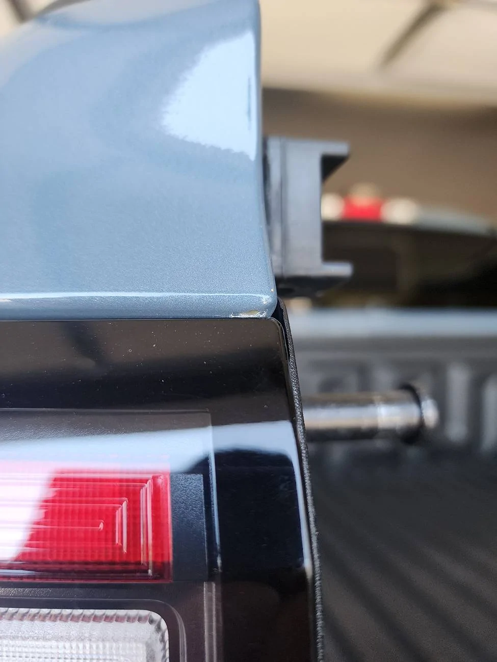 Ford Ranger Paint chipping above the tail light 1000008600
