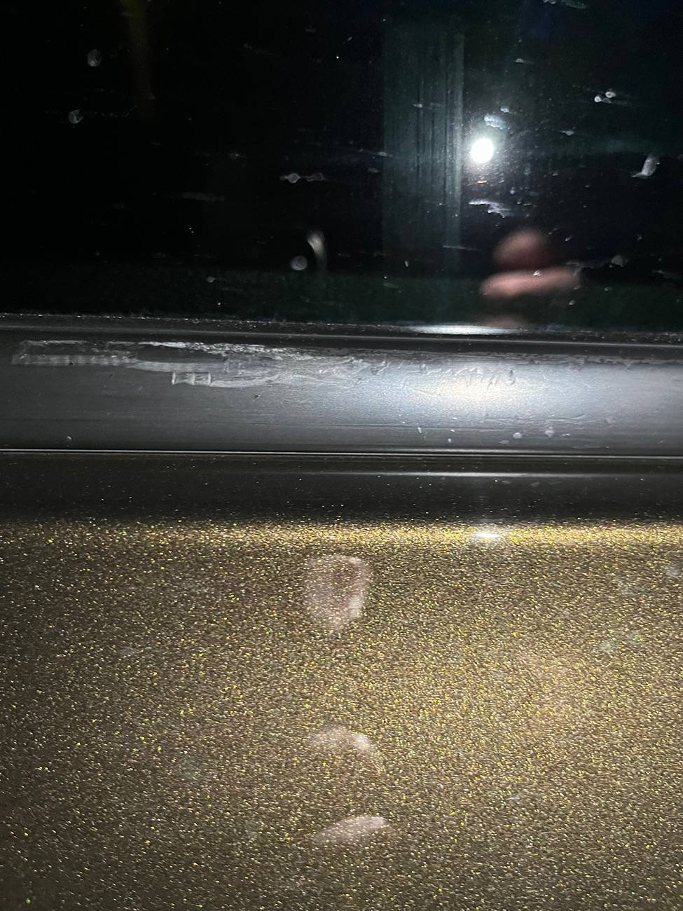 Ford Ranger Discolored rubber at base of window IMG_0956