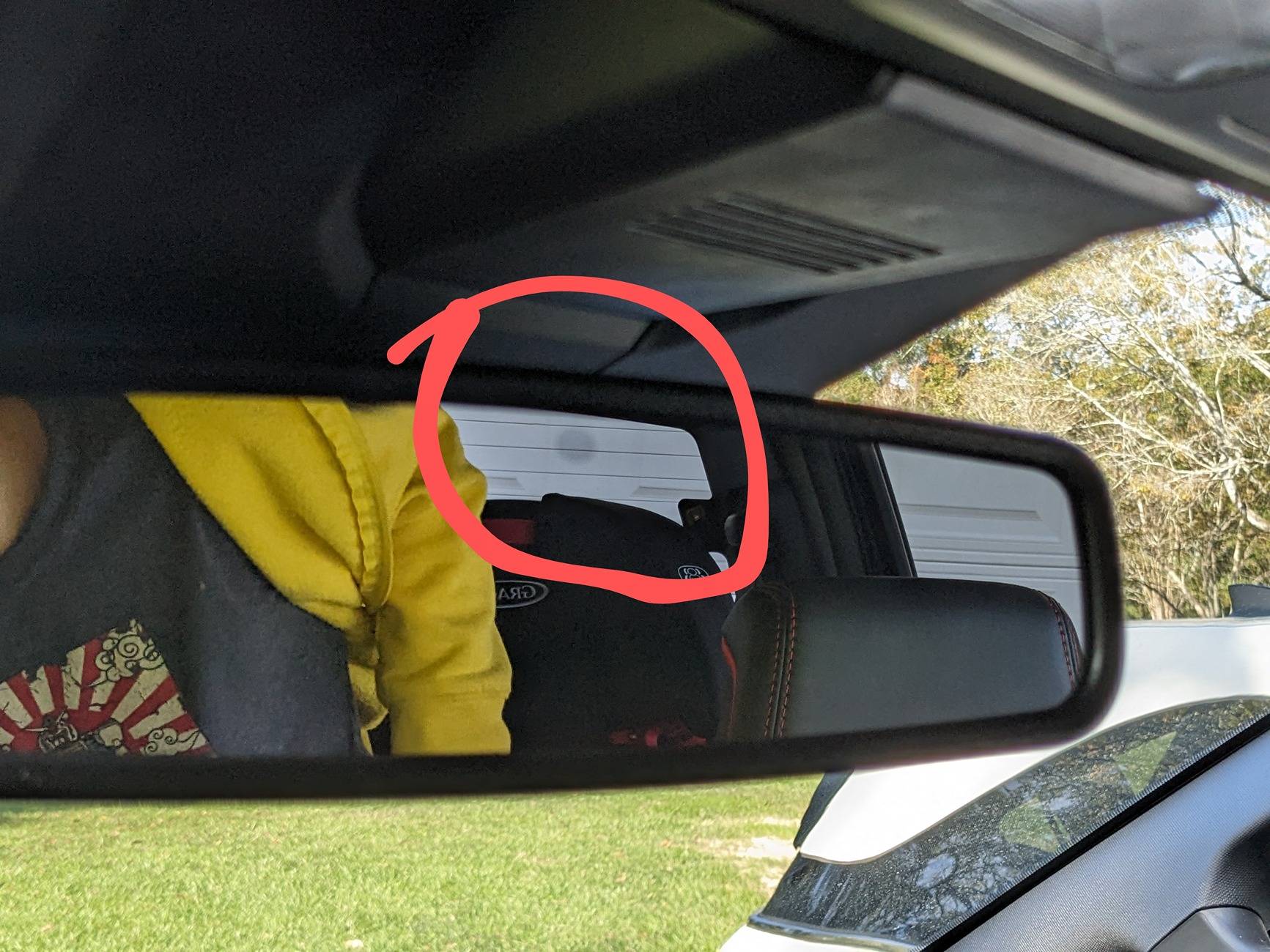 Ford Ranger Auto dimming rear view mirror defect or sensor? PXL_20241130_165809179~2