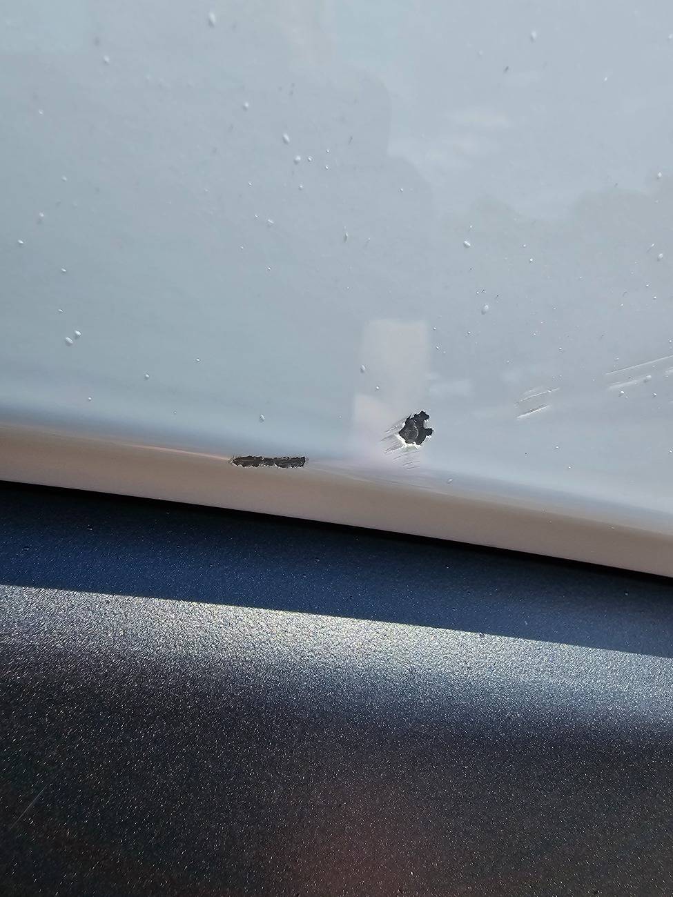 Ford Ranger Pre-delivery paint chip on Azure Gray - How concerned should I be? 20240804_154104