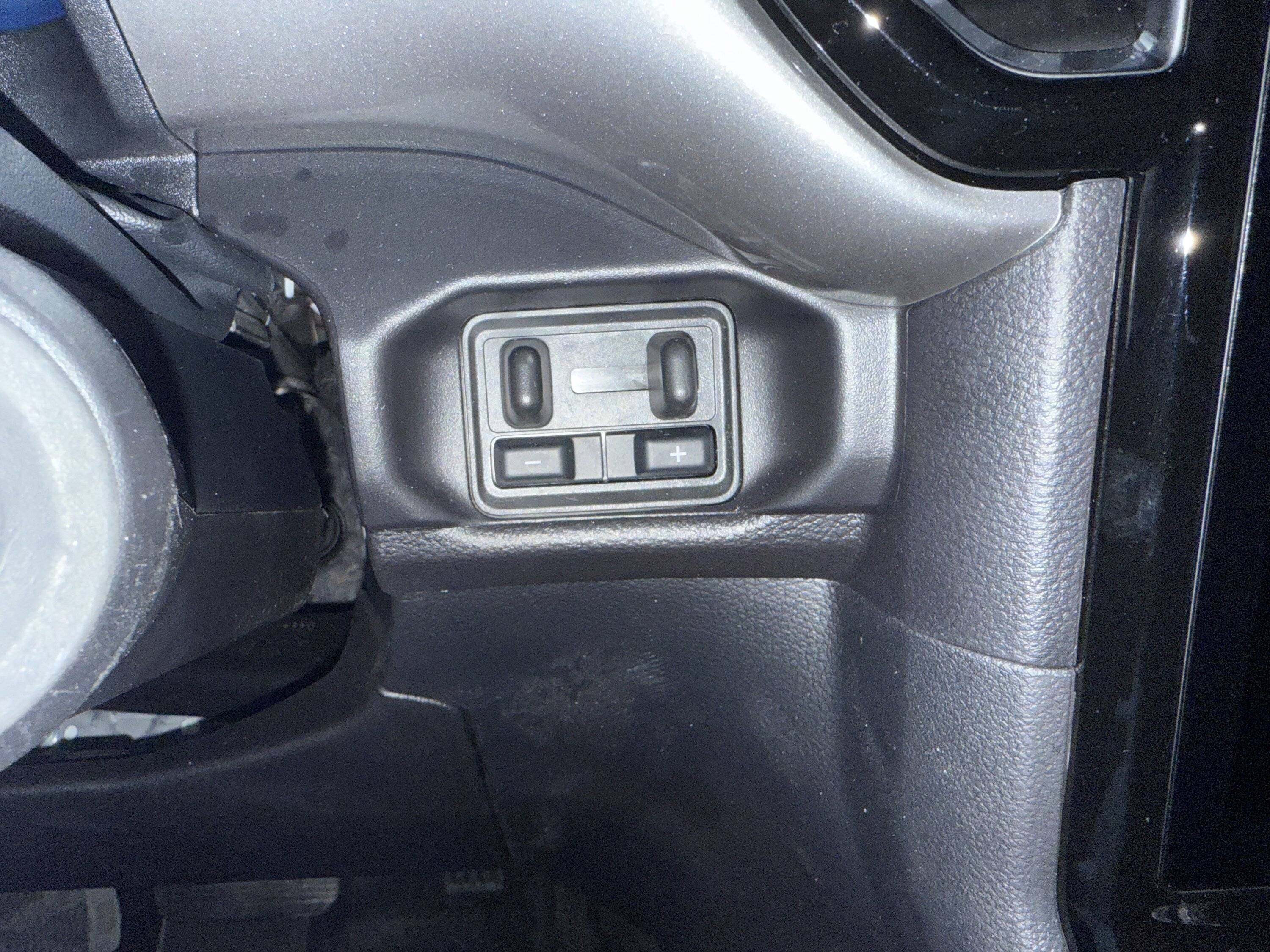 Ford Ranger Levers with + and - on the dash by Key cylinder IMG_0006.JPG