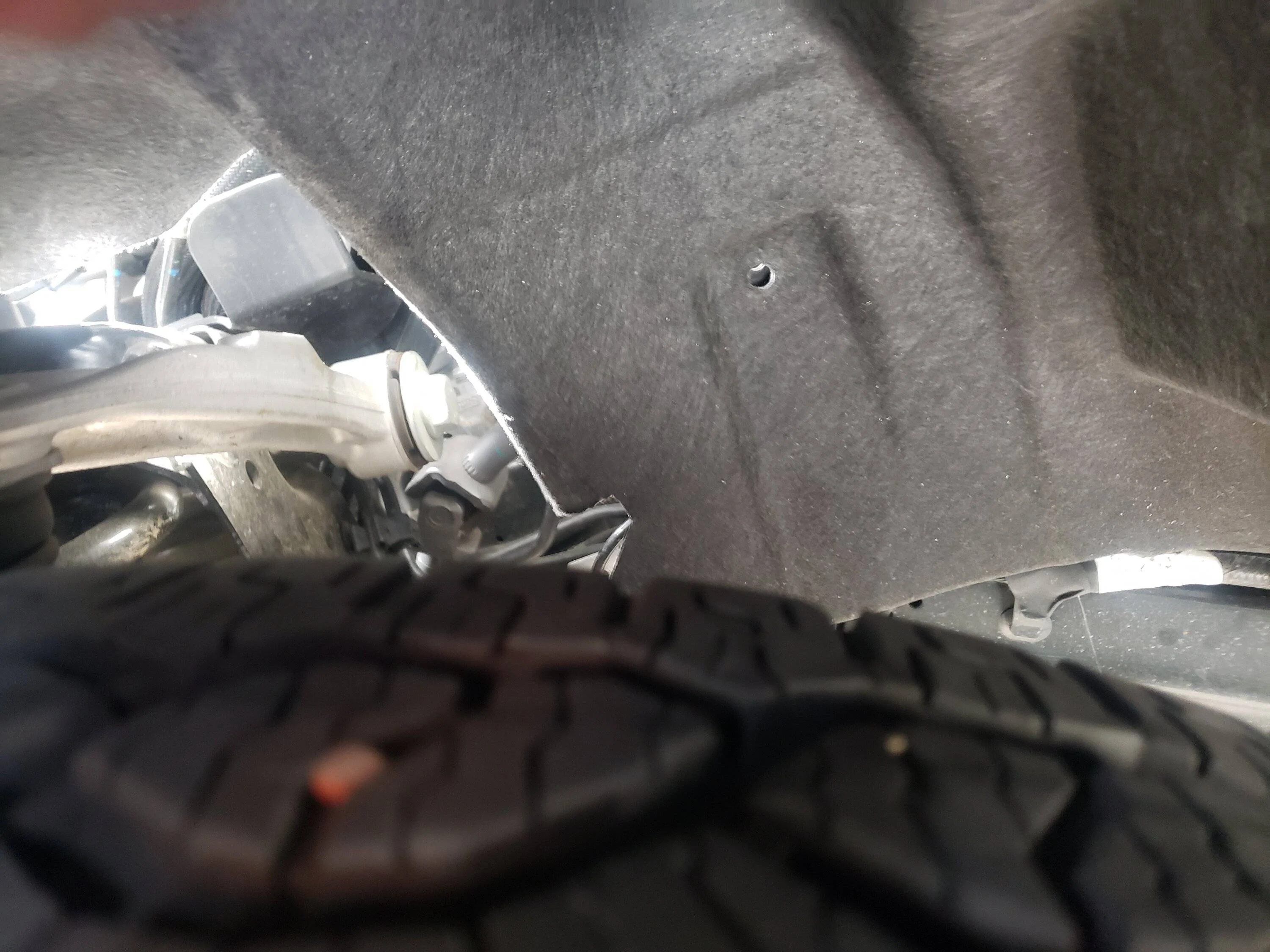only pin removed on fender skirt.jpg
