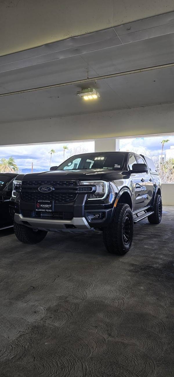 Leveled XLT with Upgraded Wheels and Tires Aggresive Stance.jpeg