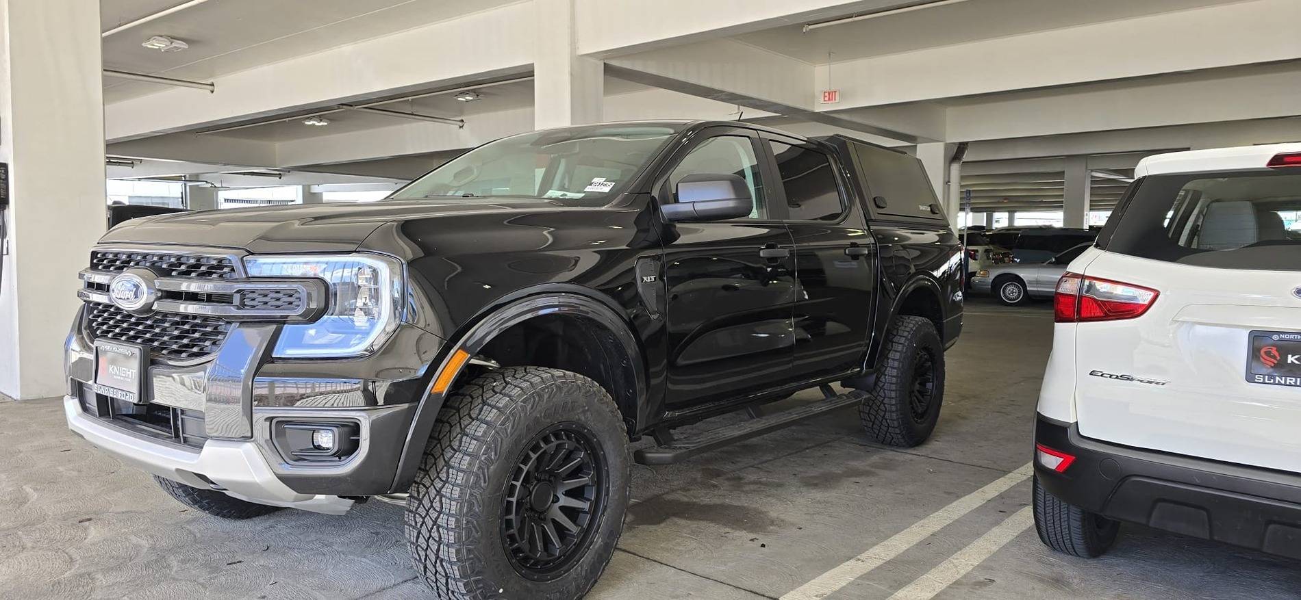 Leveled XLT with Upgraded Wheels and Tires Front_Side View.jpeg