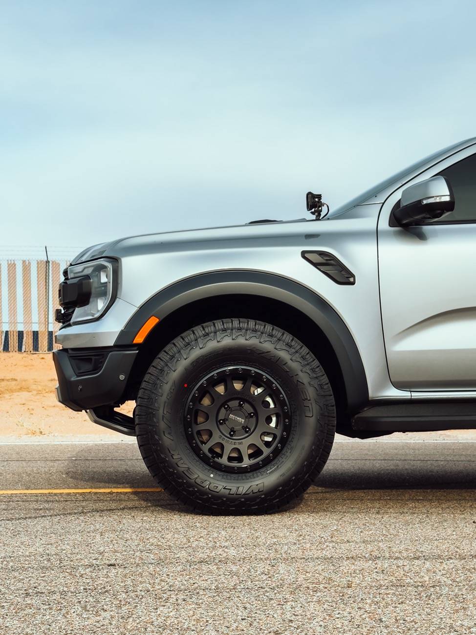 Ford Ranger FMI 2" Collars + Falken Wildpeak AT4 35/11.50/17 on 17x8.5 +25 offset KMC KM552 Wheels Raptor 17