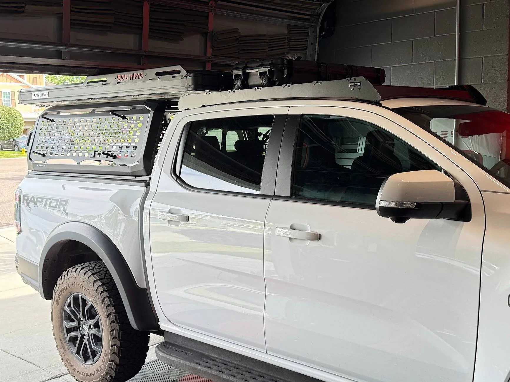 23-Installed sanhima roof rails for solar panel future install-Still fits in garage but slight...jpg