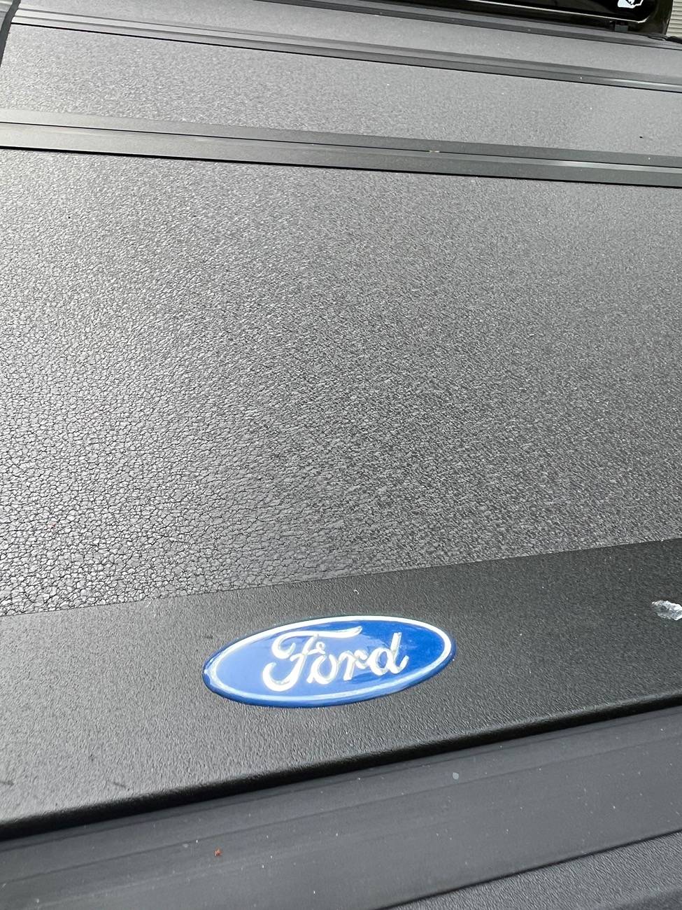 Ford Ranger Leer Ford Hard Folding 4-Panel Bed Cover (Leer HF650M) already Bubbling. IMG_1153