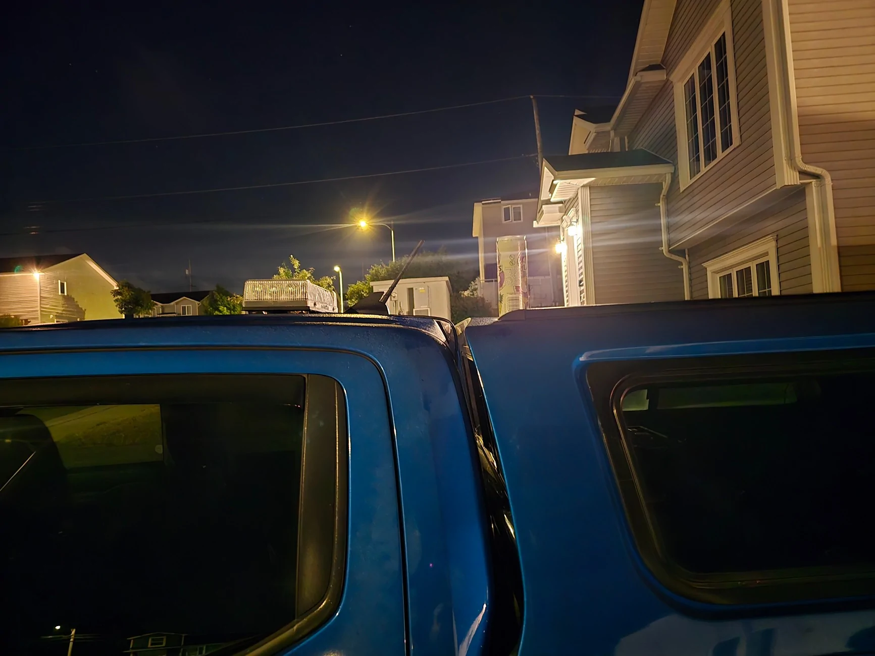 Ford Ranger 2025 XLT with a A.R.E. CX Classic truck cap installed 20250814_001035