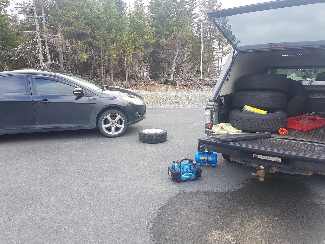 Ford Ranger 2025 XLT with a A.R.E. CX Classic truck cap installed 20181111_131516