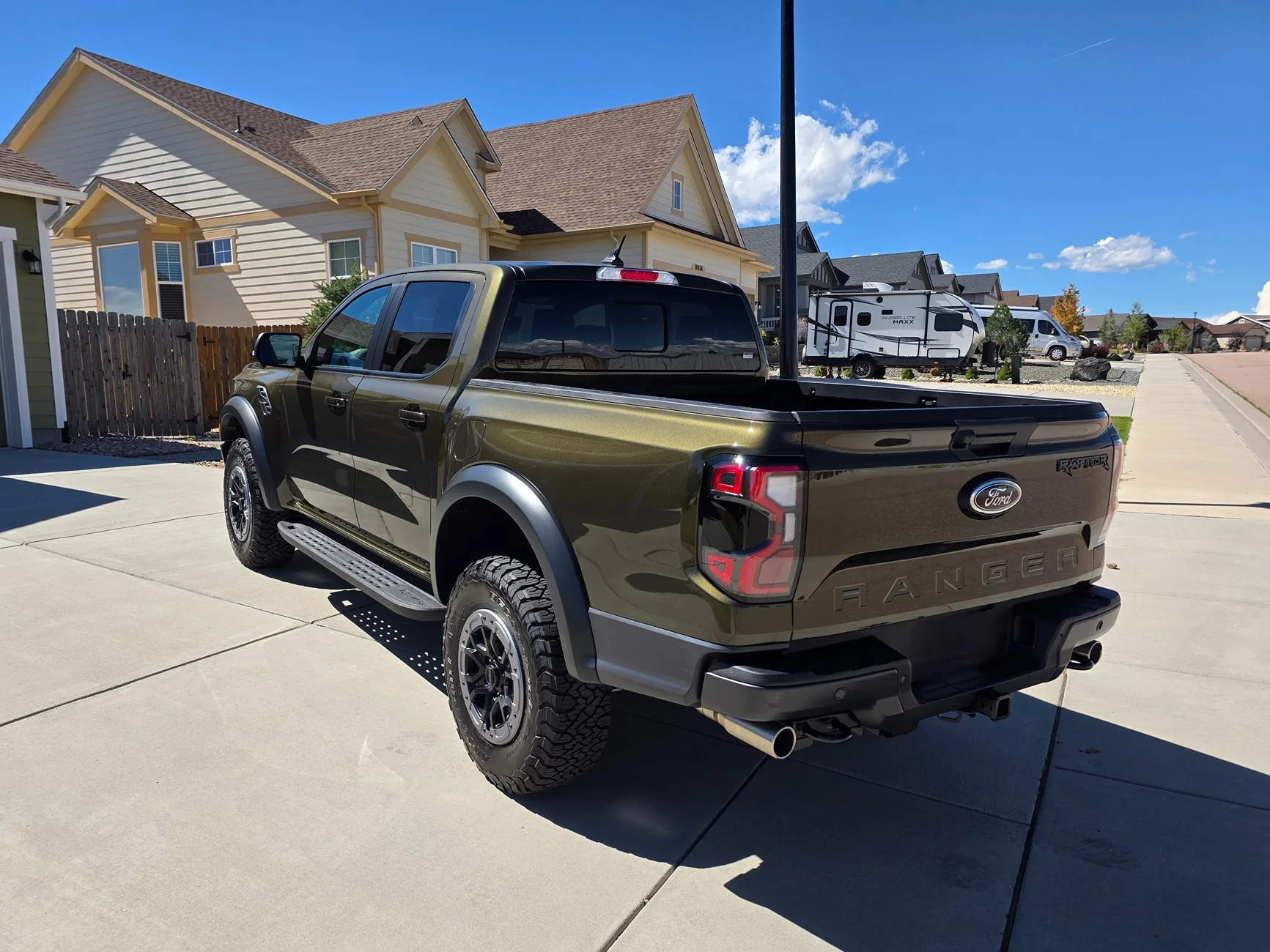 Ford Ranger Debadged Shelter Green Ranger Raptor in direct sunlight. 20250910_140653