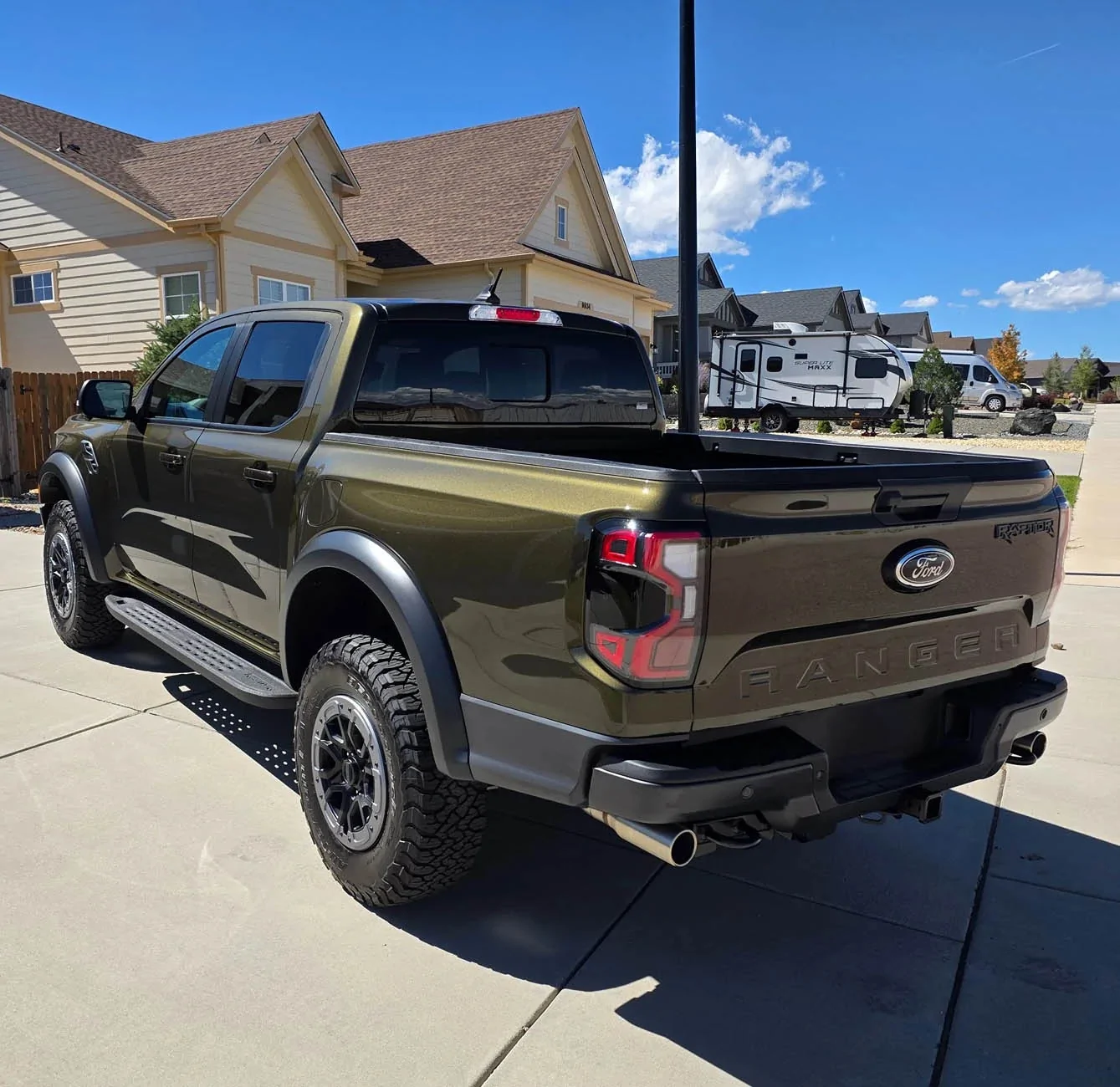 Ford Ranger Debadged Shelter Green Ranger Raptor in direct sunlight. 20250910_140653a