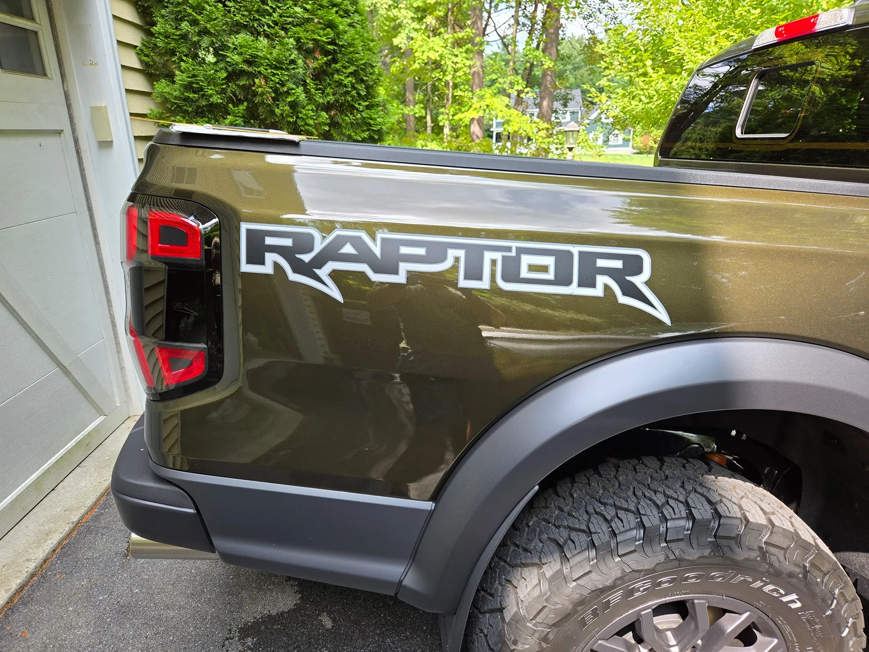 Ford Ranger Debadged Shelter Green Ranger Raptor in direct sunlight. 1000013484