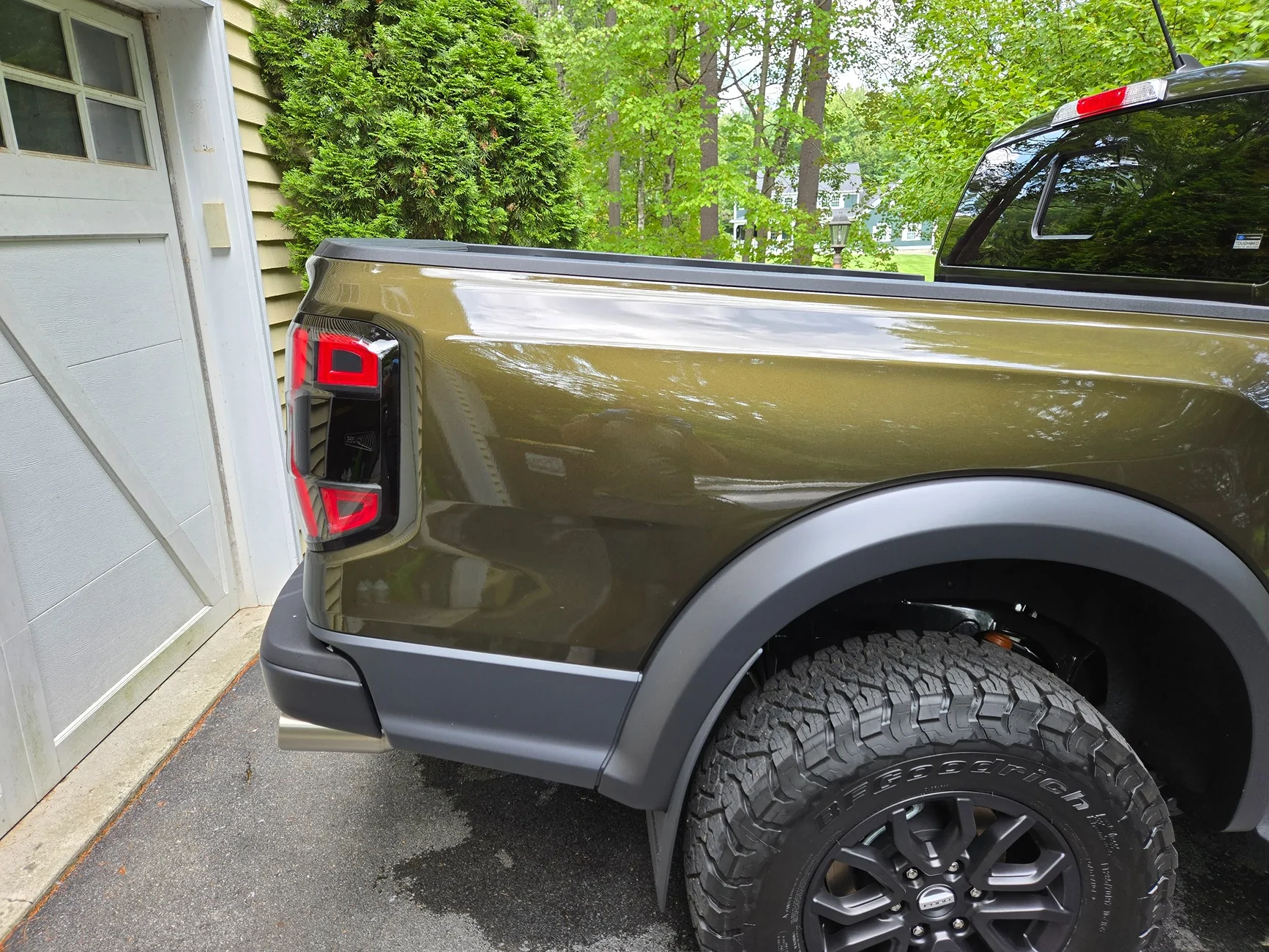 Ford Ranger Debadged Shelter Green Ranger Raptor in direct sunlight. 1000013486