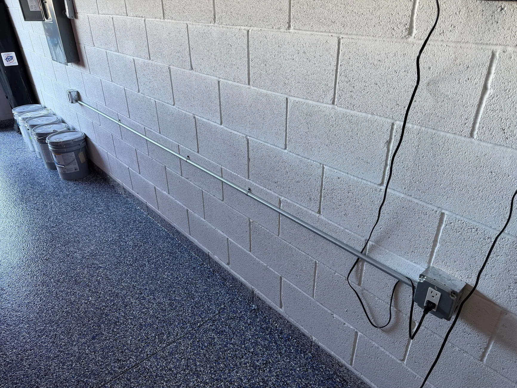 Ford Ranger Battery tender charger mounted high on garage wall IMG_7846