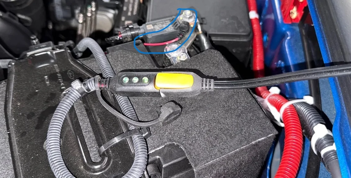 Ford Ranger Battery tender charger mounted high on garage wall batterymonitor