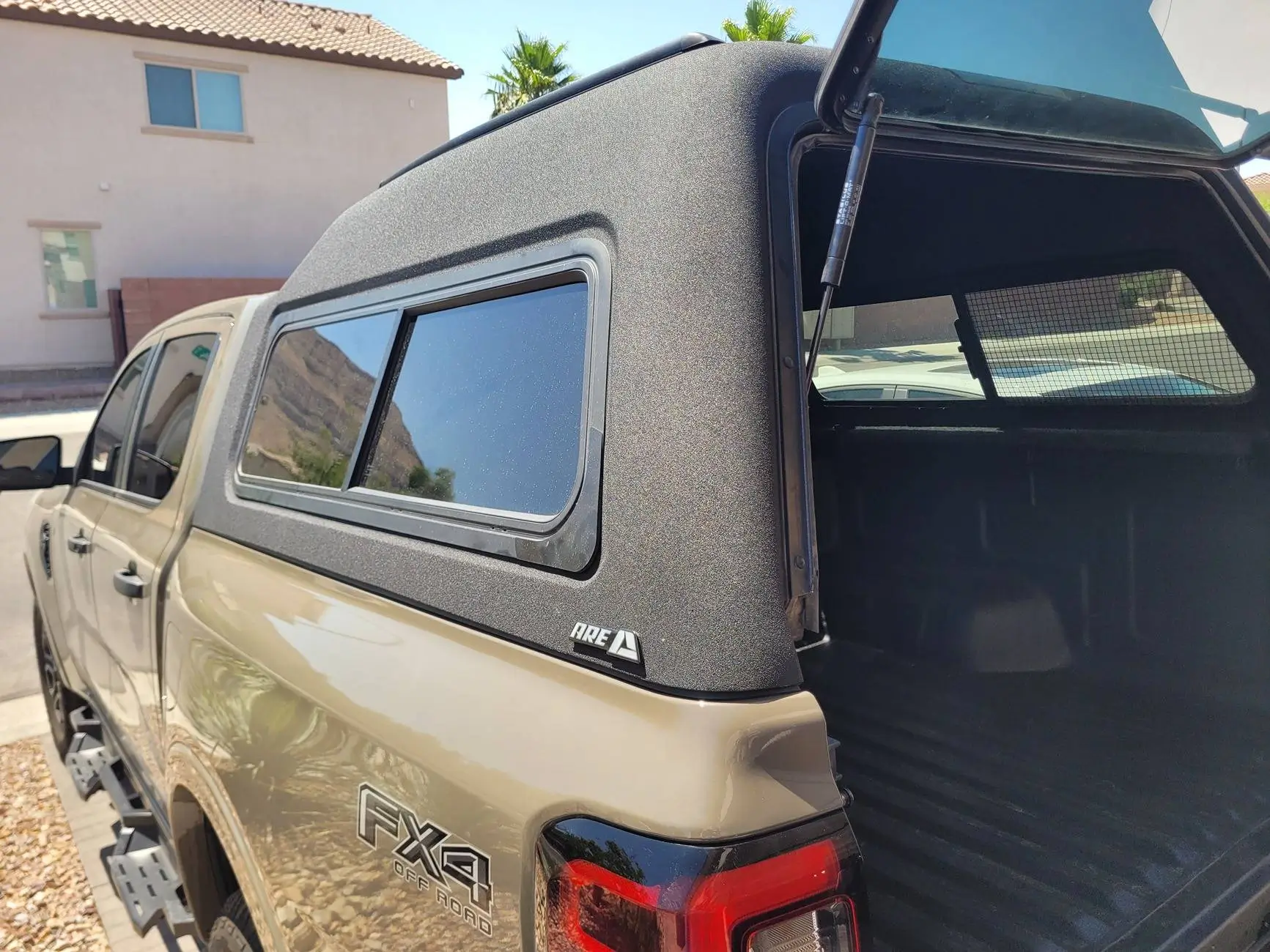 Ford Ranger 2025 XLT with a A.R.E. CX Classic truck cap installed 1762203399006-v1