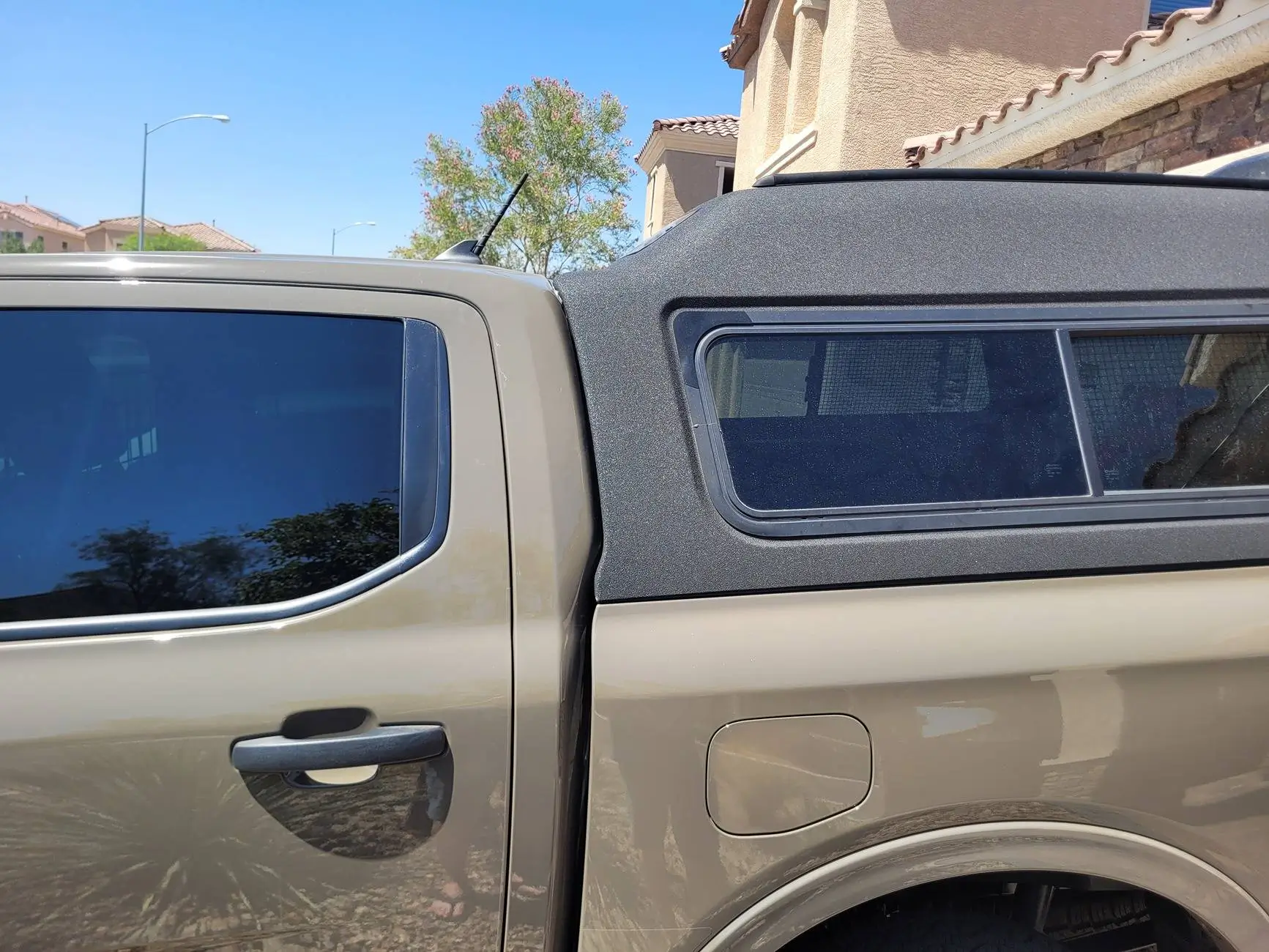 Ford Ranger 2025 XLT with a A.R.E. CX Classic truck cap installed 1762203439128-2s