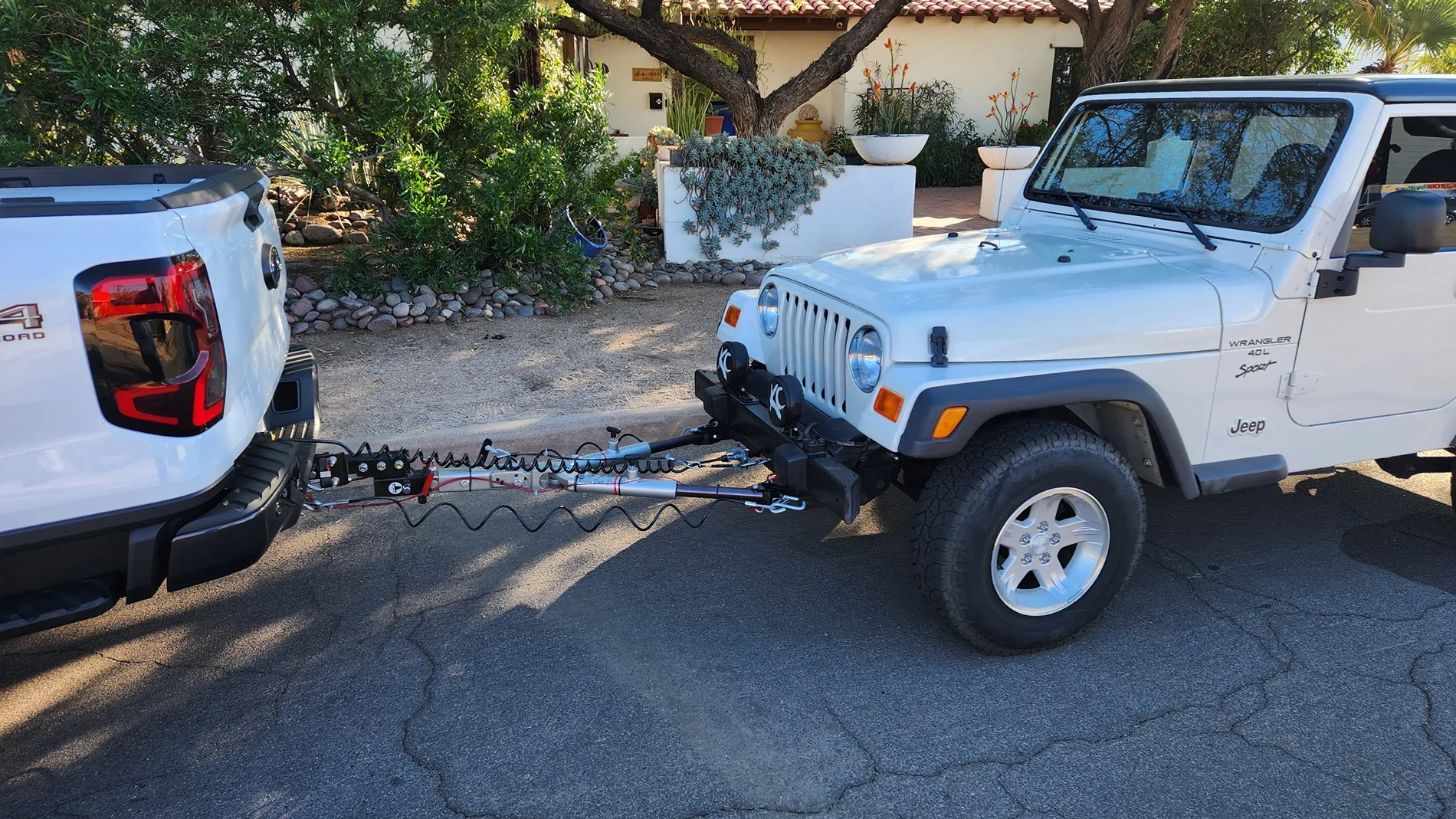 Ford Ranger Towing a Jeep Ready Brut