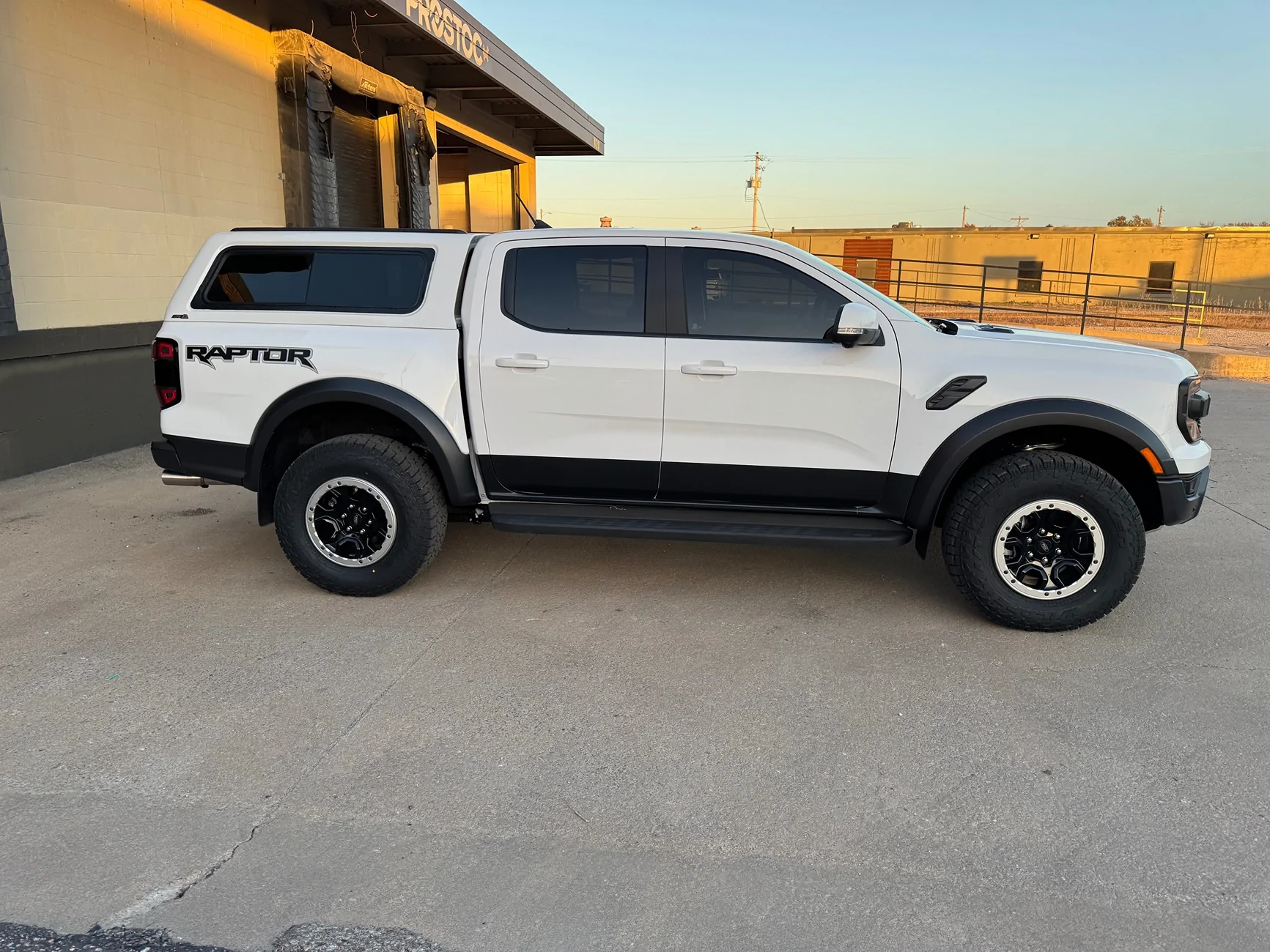 Ford Ranger 2025 XLT with a A.R.E. CX Classic truck cap installed IMG_4642