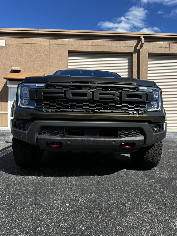 Ford Ranger Exterior mods: painted exhaust, tow hooks, calipers + rhino lined lower grill and skid plate IMG_6043-XL