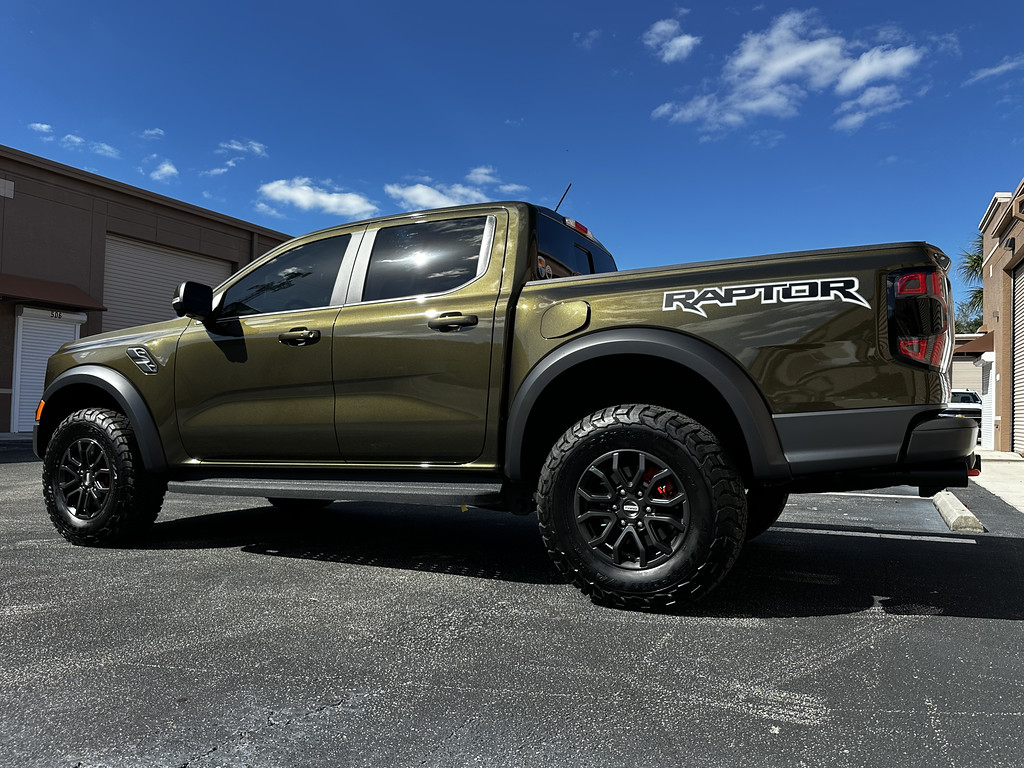 Ford Ranger Exterior mods: painted exhaust, tow hooks, calipers + rhino lined lower grill and skid plate IMG_6053-XL