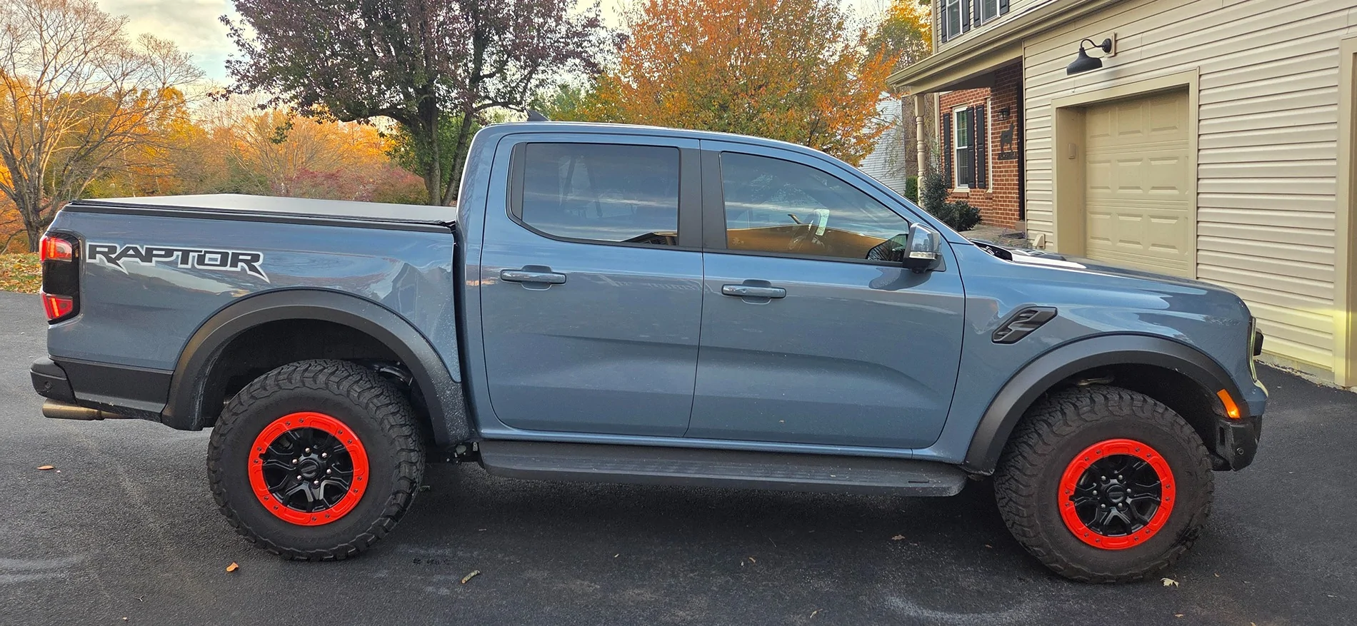 Ford Ranger Exterior mods: painted exhaust, tow hooks, calipers + rhino lined lower grill and skid plate 20251101_080119
