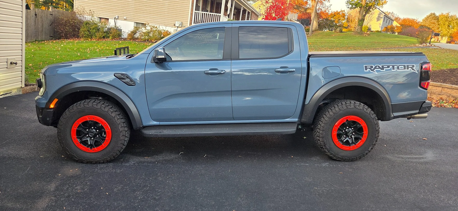 Ford Ranger Exterior mods: painted exhaust, tow hooks, calipers + rhino lined lower grill and skid plate 20251101_080103