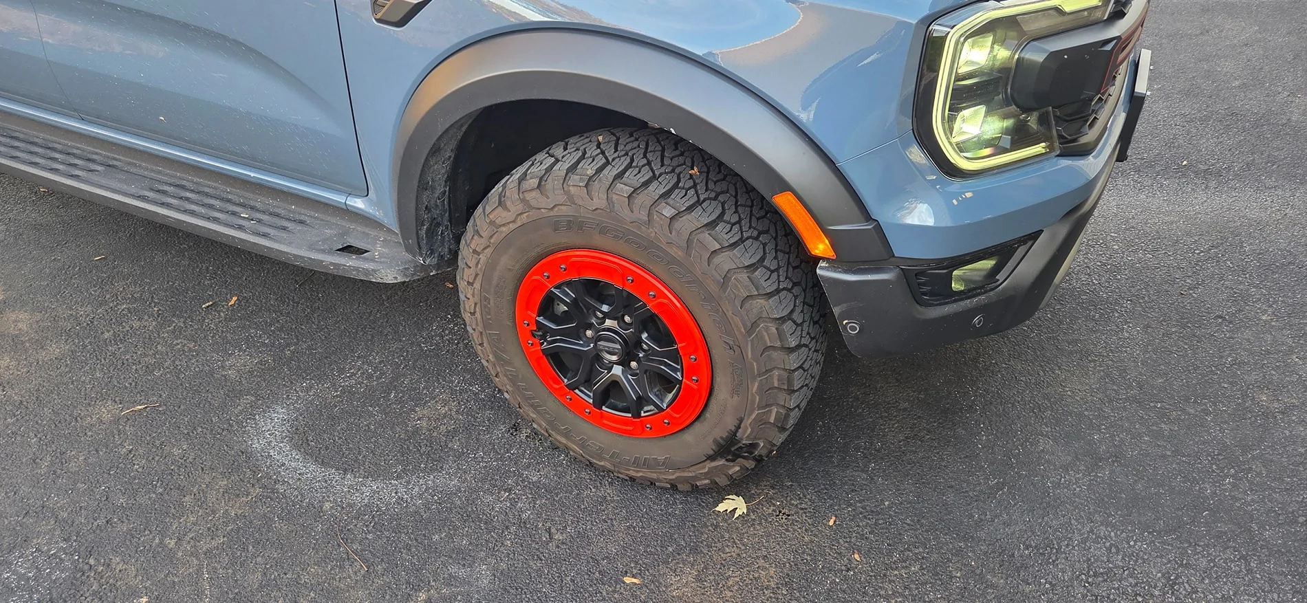 Ford Ranger Exterior mods: painted exhaust, tow hooks, calipers + rhino lined lower grill and skid plate 20251101_080128