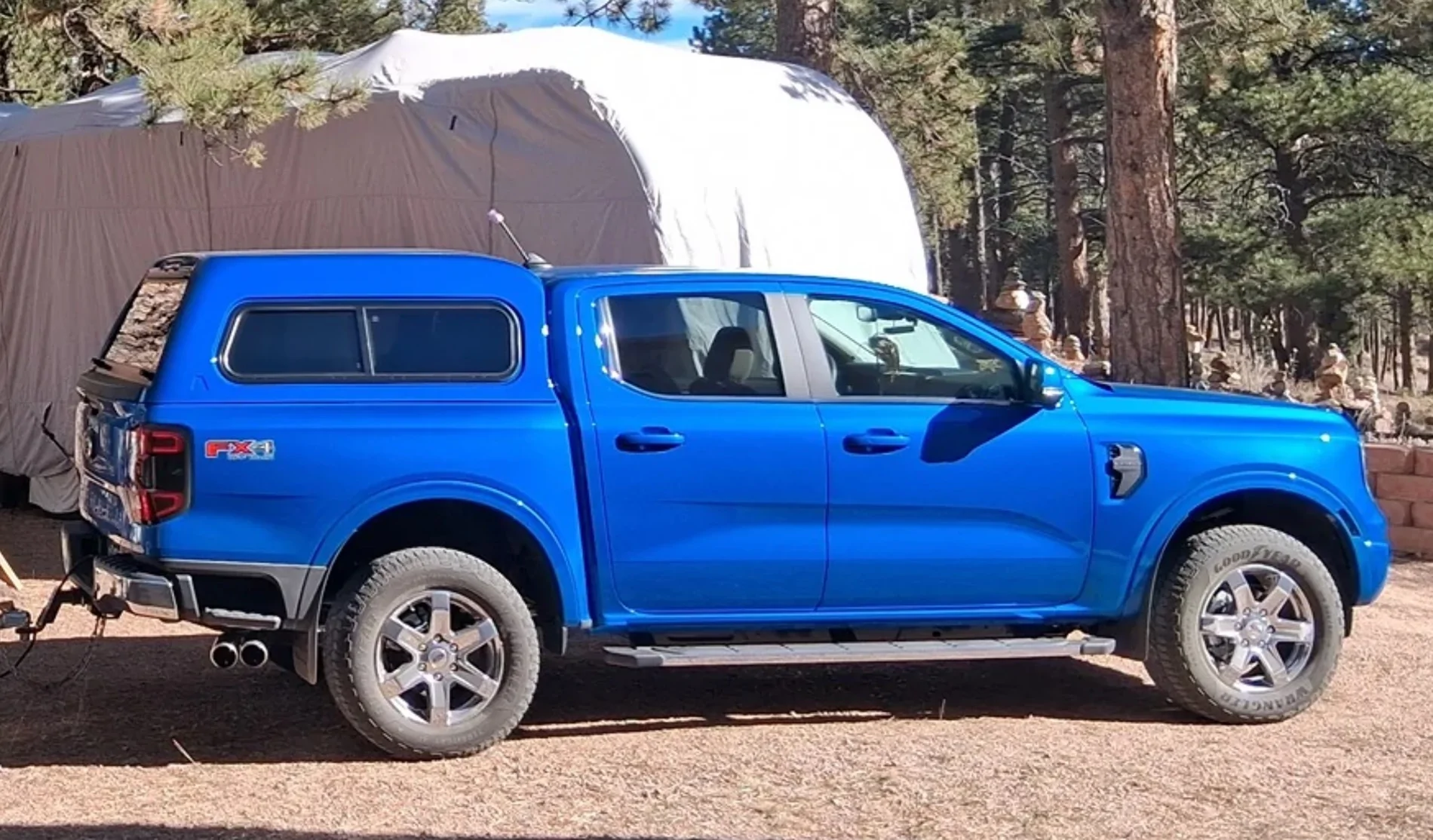 Ford Ranger 2025 XLT with a A.R.E. CX Classic truck cap installed IMG_6079