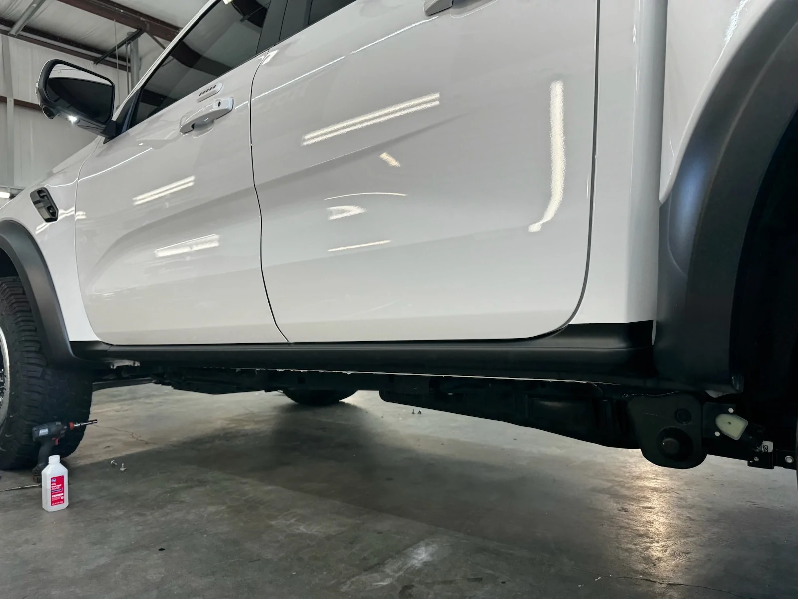 Rock guard in front of rear wheels, what are my options? RIP my paint ...