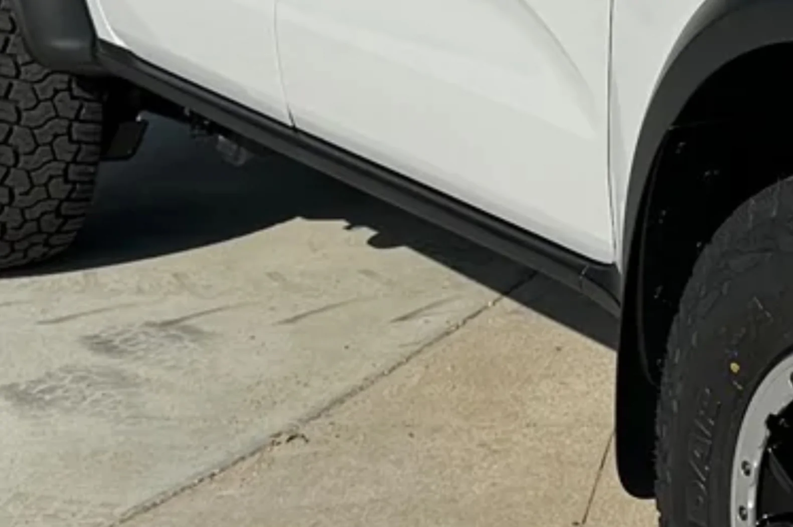 Rock guard in front of rear wheels, what are my options? RIP my paint ...