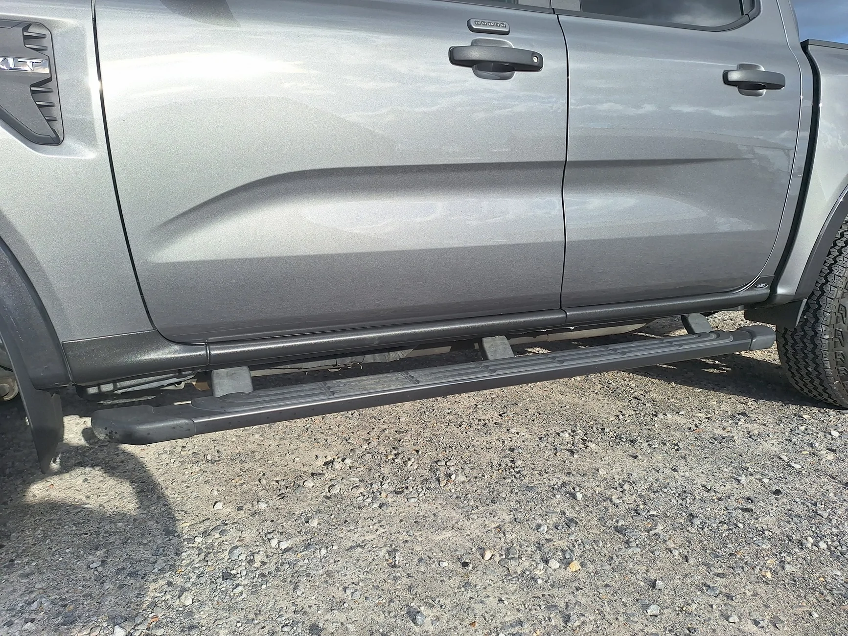 Rock guard in front of rear wheels, what are my options? RIP my paint ...