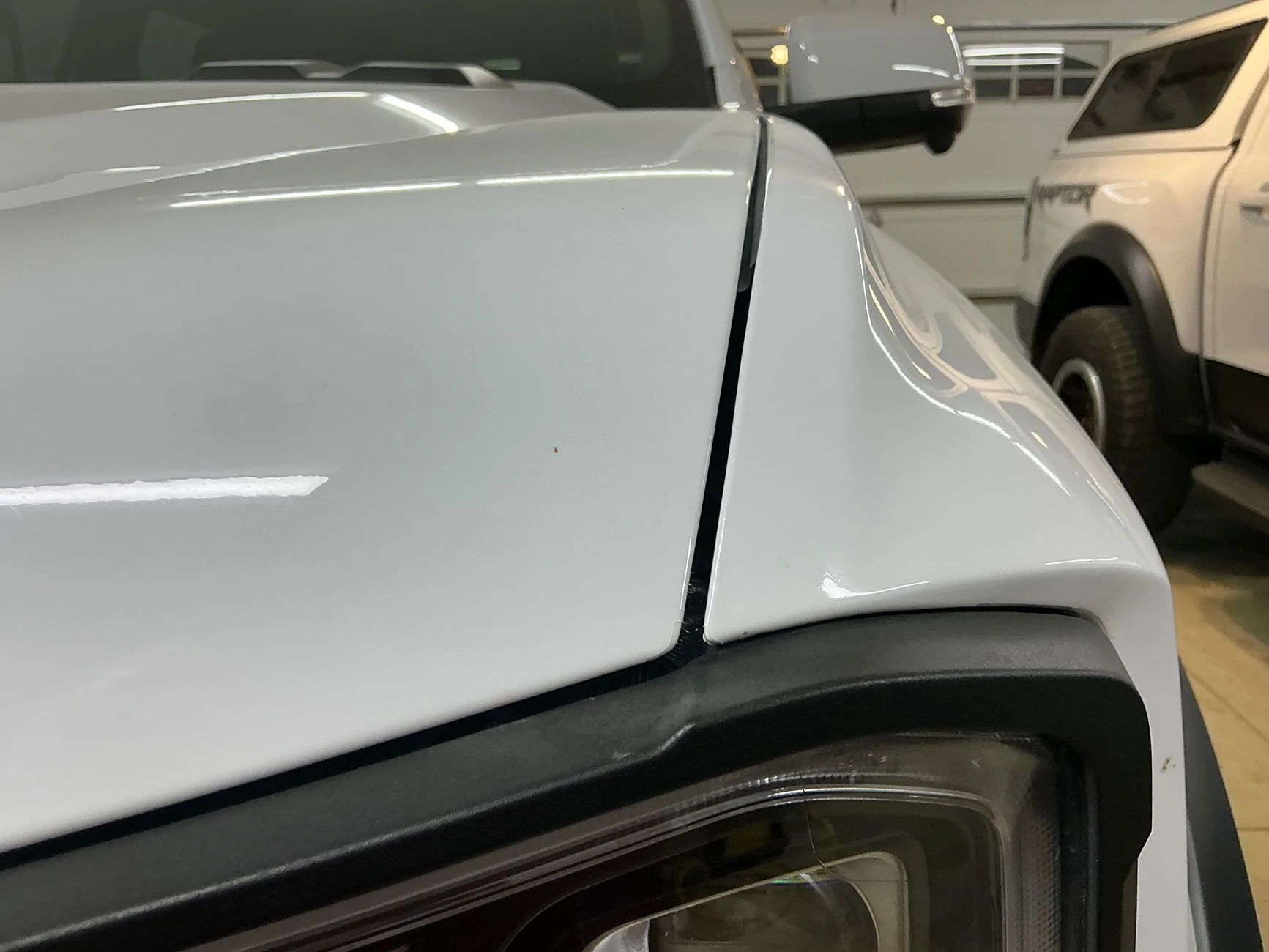 Ford Ranger Anyone know the best way to adjust a hood to fix gaps and stop wind flutter? IMG_6707
