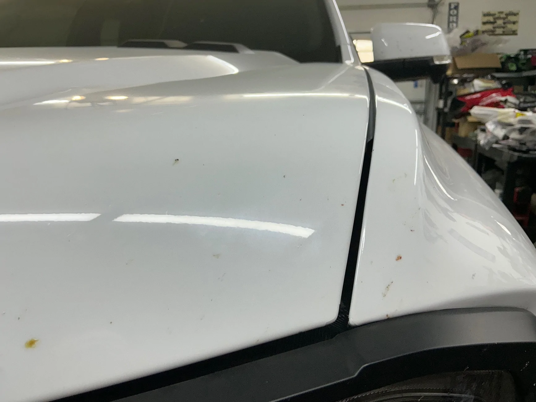 Ford Ranger Anyone know the best way to adjust a hood to fix gaps and stop wind flutter? IMG_6719