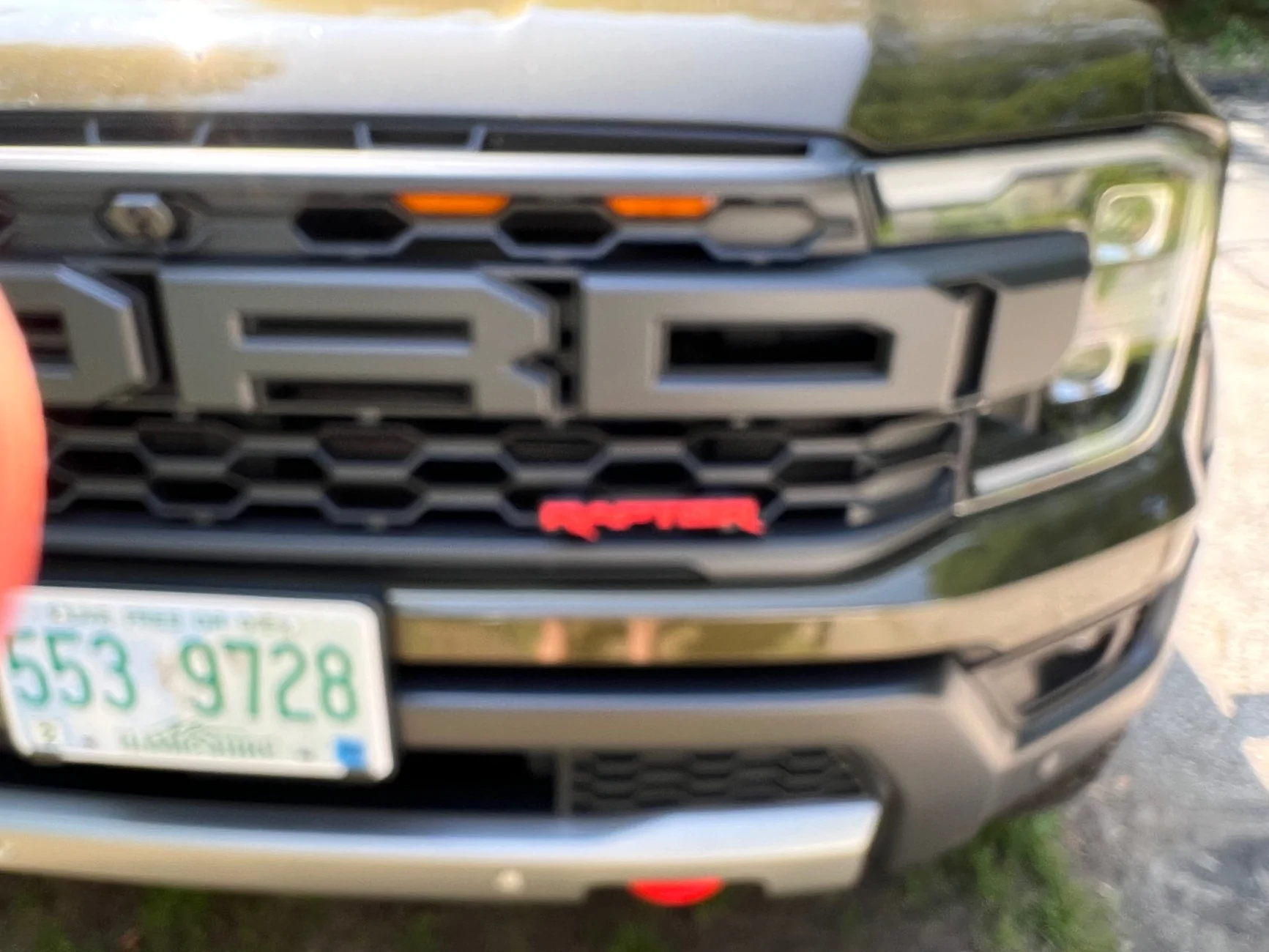 Ford Ranger Installed Tukskinz Raptor emblem and tailgate inserts IMG_1360