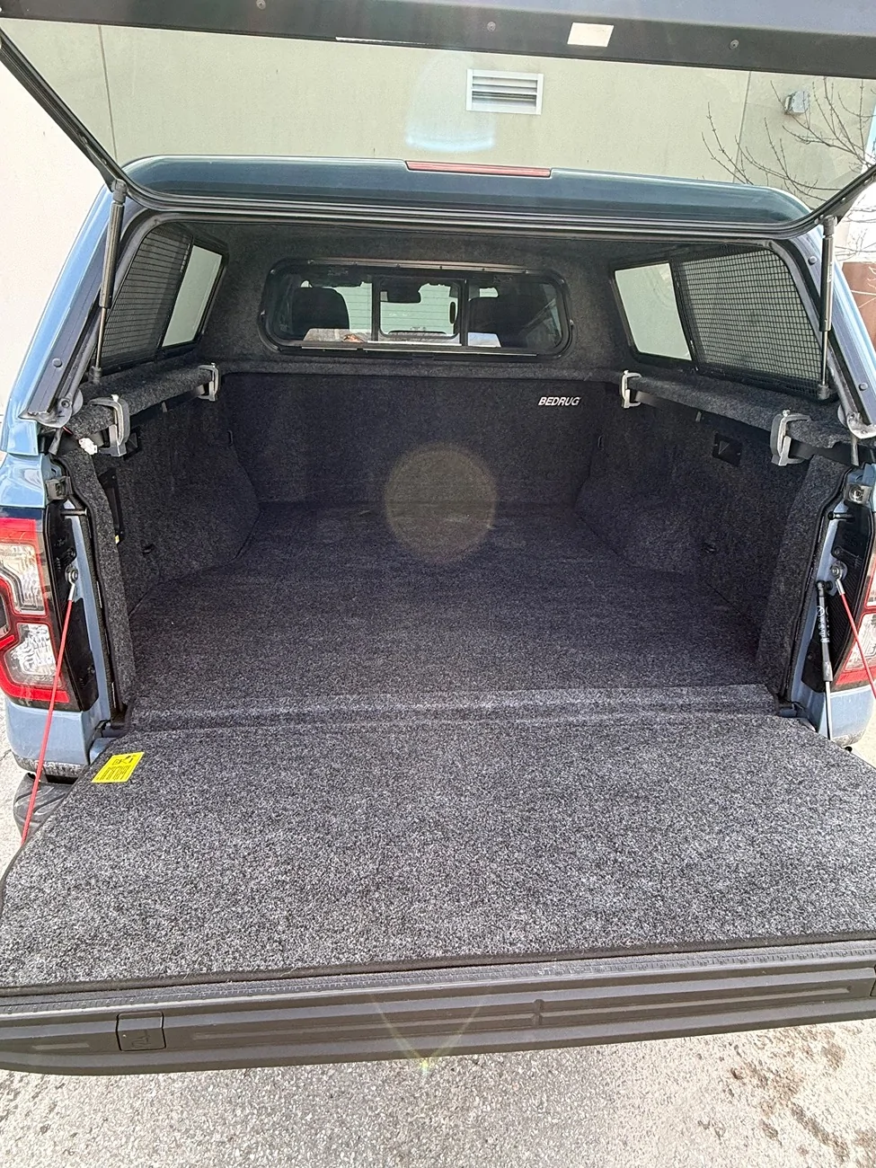 Ford Ranger Ranch Cap and Bedrug Installed on a 2024 IMG_1968