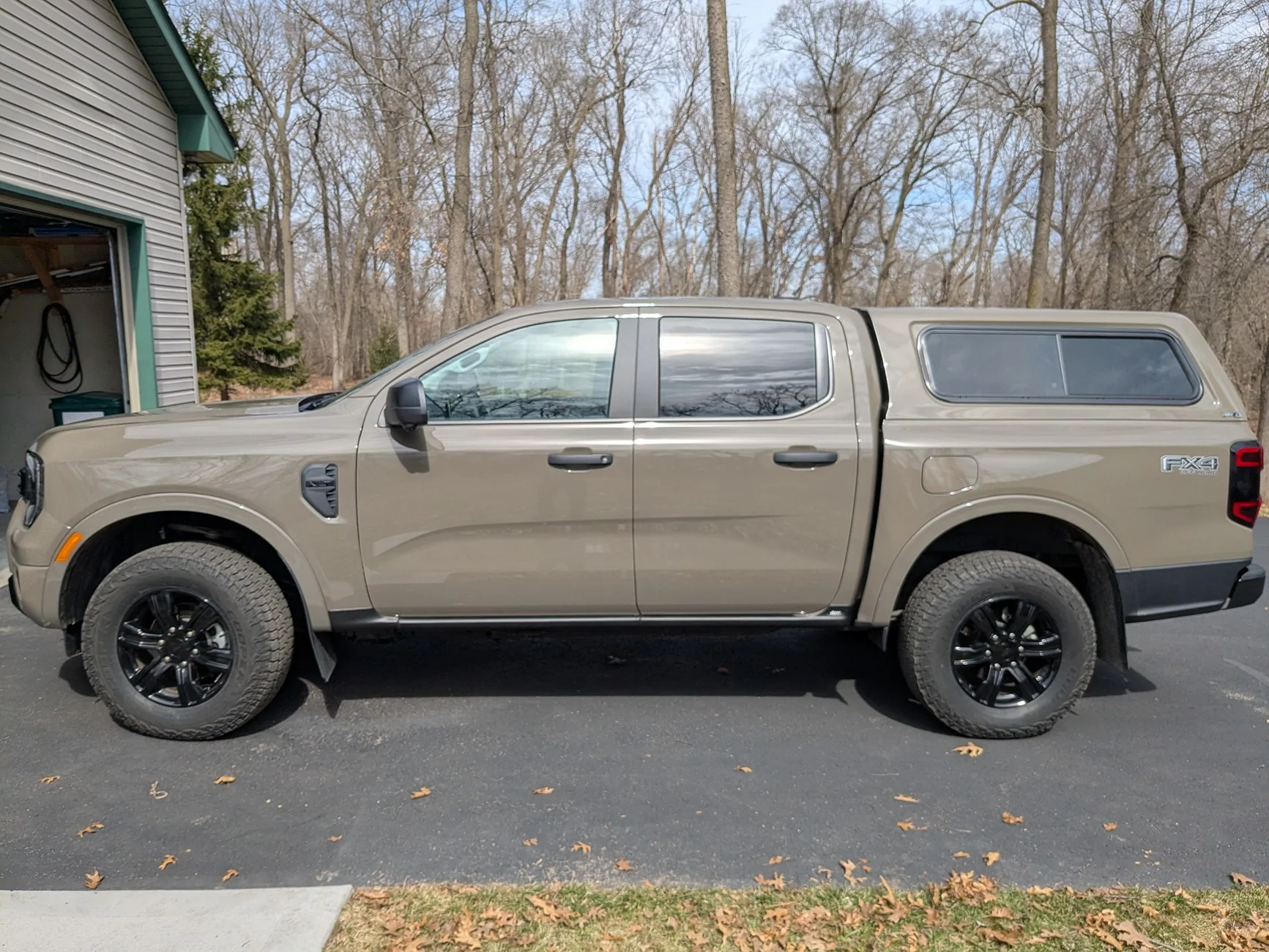 Ford Ranger 2025 XLT with a A.R.E. CX Classic truck cap installed PXL_20260329_170418302
