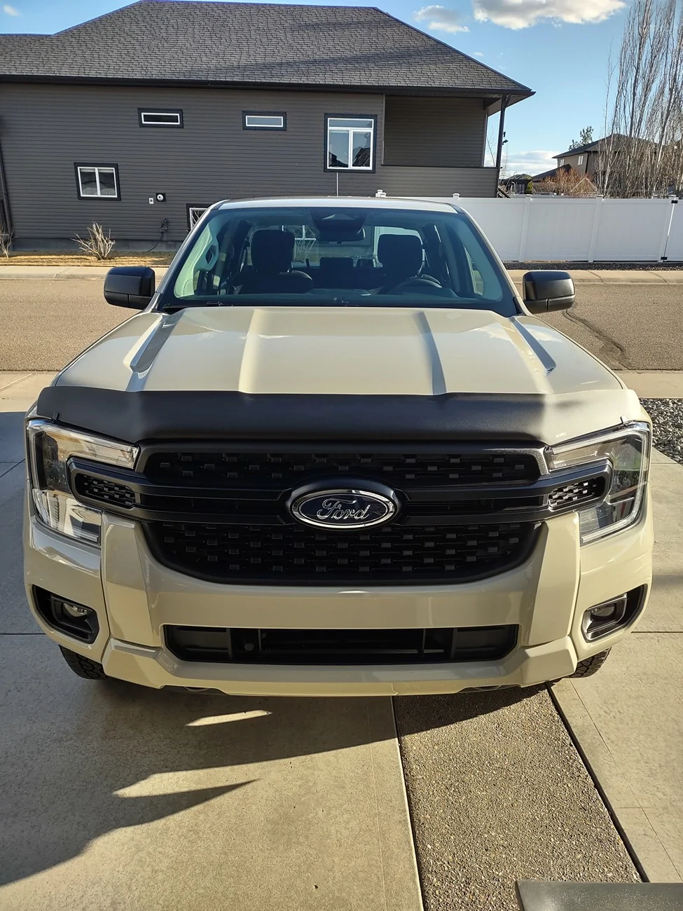 Ford Ranger Matte black Airplex Hood protector installed on Desert Sand 2025 Ranger. IMG_20260404_181224234_HDR