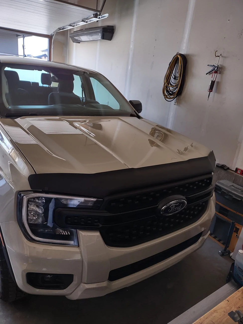 Ford Ranger Matte black Airplex Hood protector installed on Desert Sand 2025 Ranger. IMG_20260404_181420287_HDR
