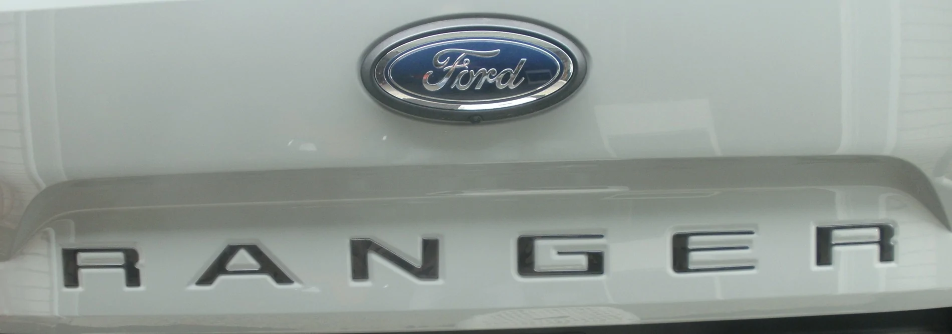 Ford Ranger Installed Tukskinz Raptor emblem and tailgate inserts Tailgate letter non reflectiv