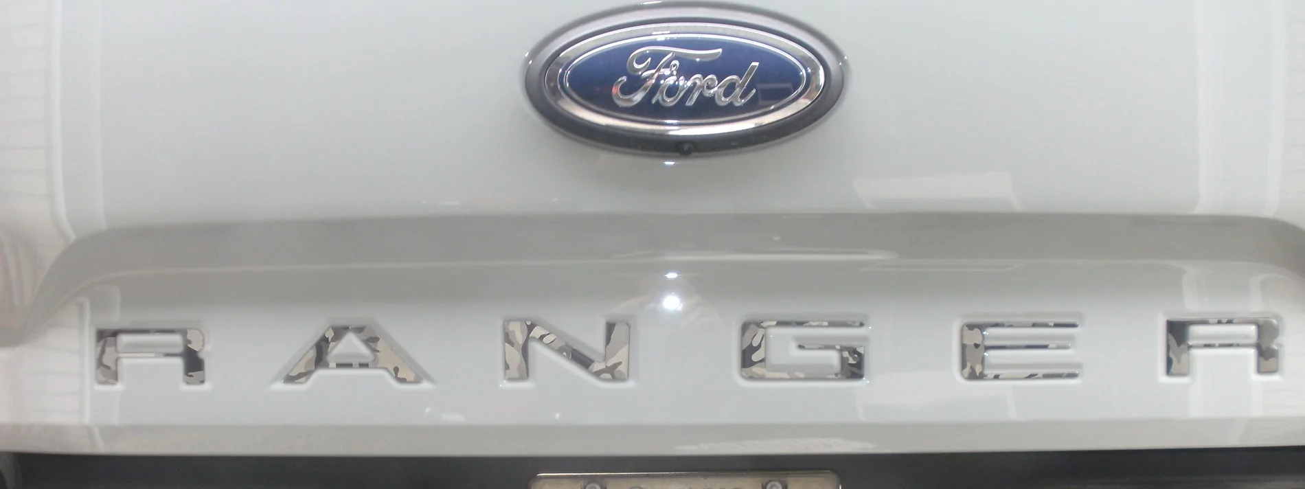 Ford Ranger Installed Tukskinz Raptor emblem and tailgate inserts Tailgate lettering reflectiv