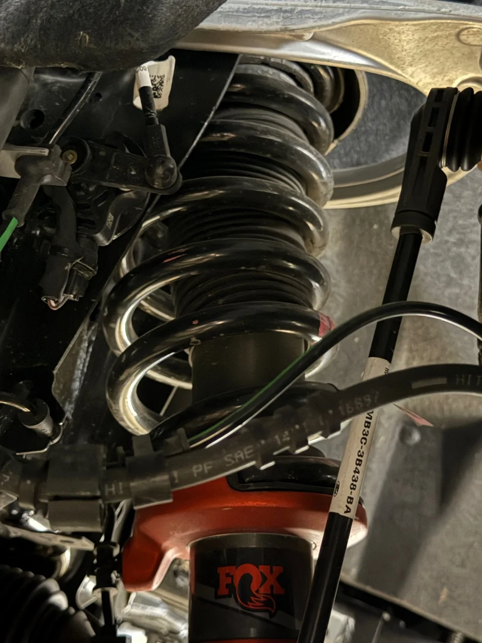 Ford Ranger Any ideas?  Front springs rubbing on shocks!!! IMG_3023
