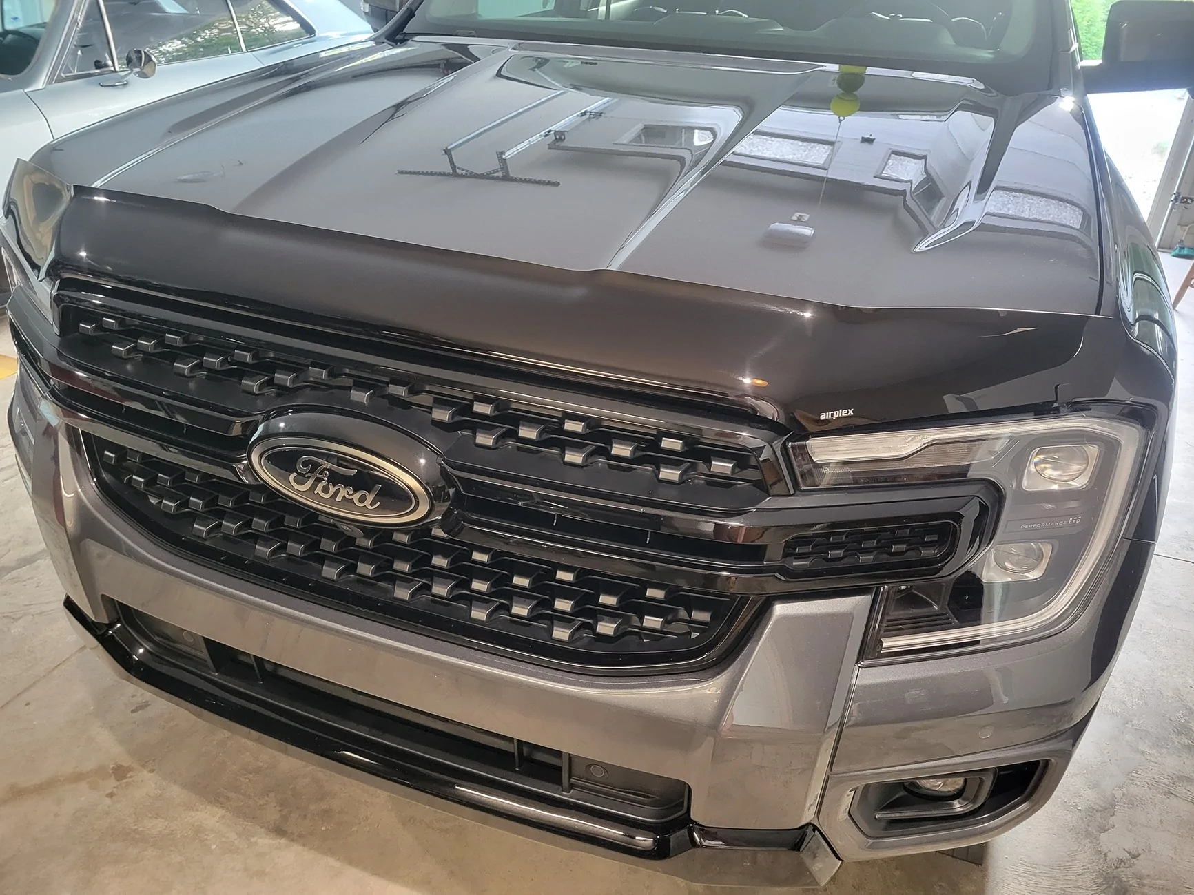 Ford Ranger Anyone Know of Any Bug / Stone Guards for Hood that Go All Way Across? 20260630_072205