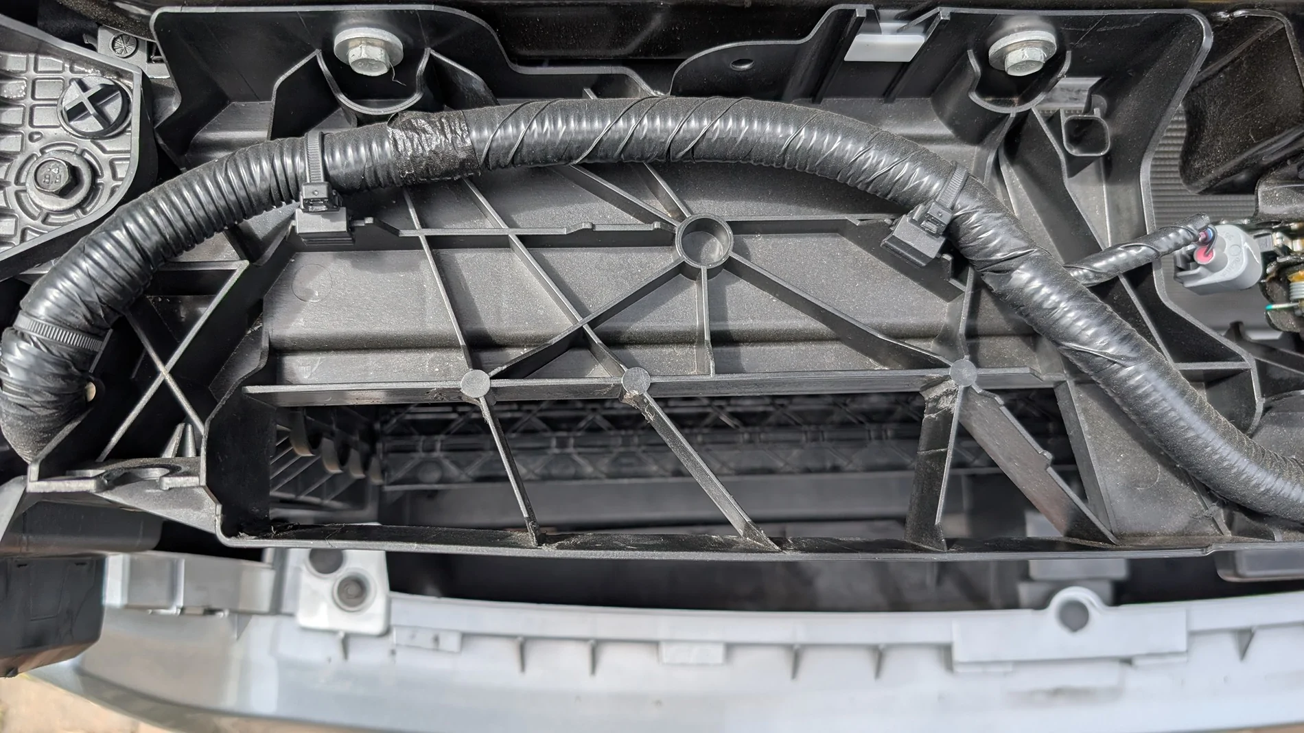 Ford Ranger Cutting out the plastic webbing at cold air inlet PXL_20260713_221551784