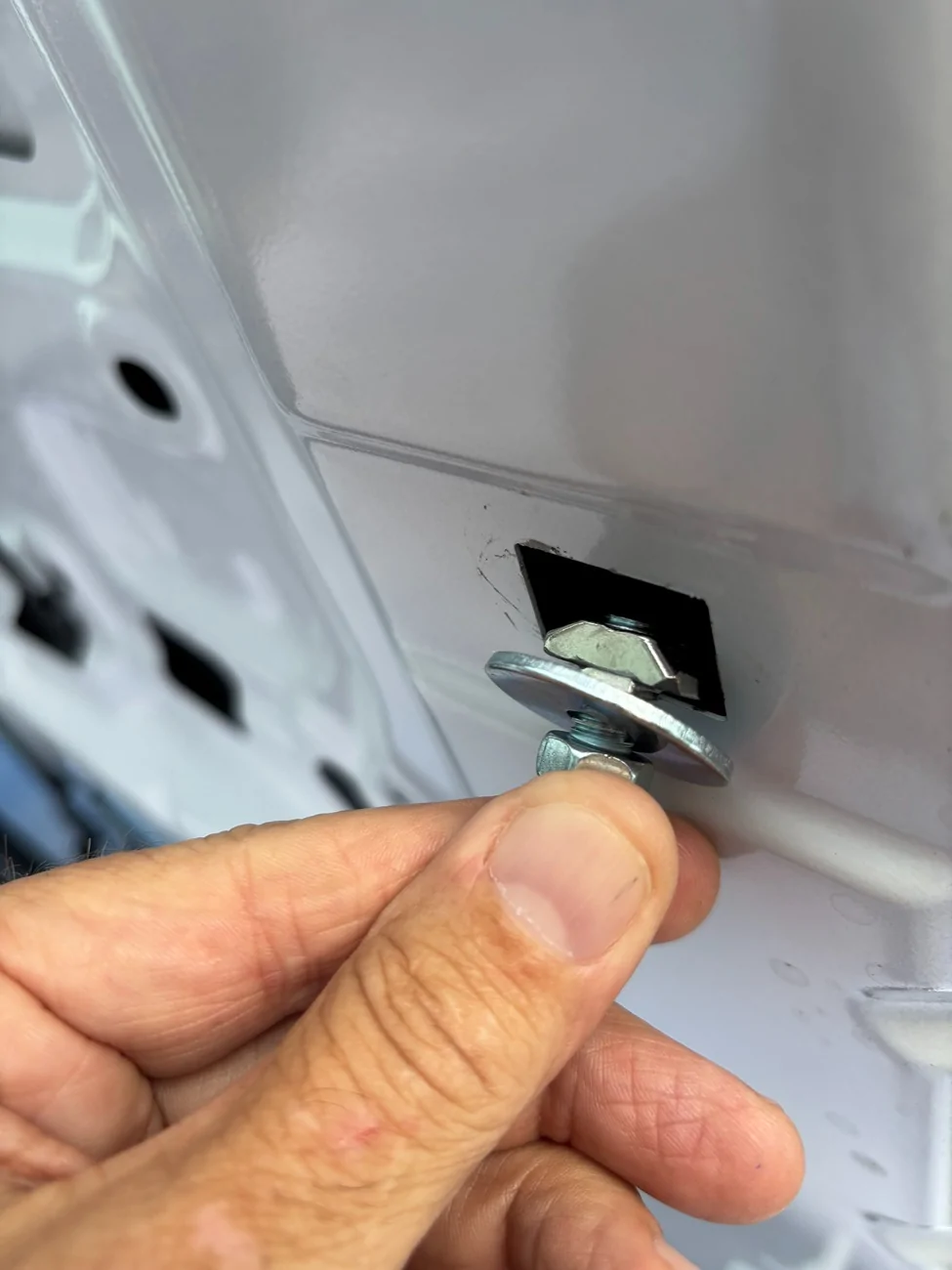 Ford Ranger Hole in hood for gas pistons Nut is too small